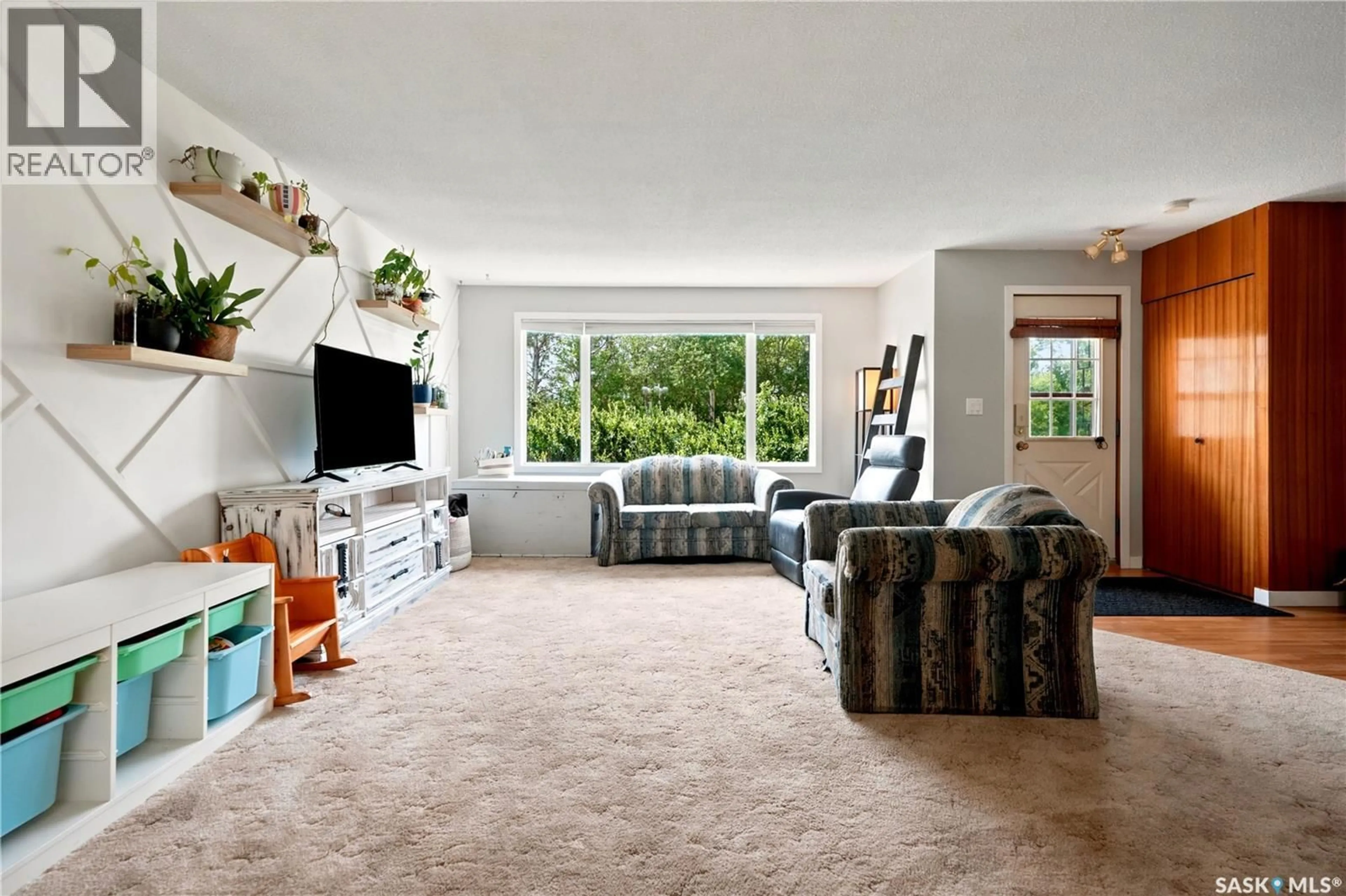 Living room with furniture, carpet floor for 133 POLLARD STREET, Earl Grey Saskatchewan S0G1J0
