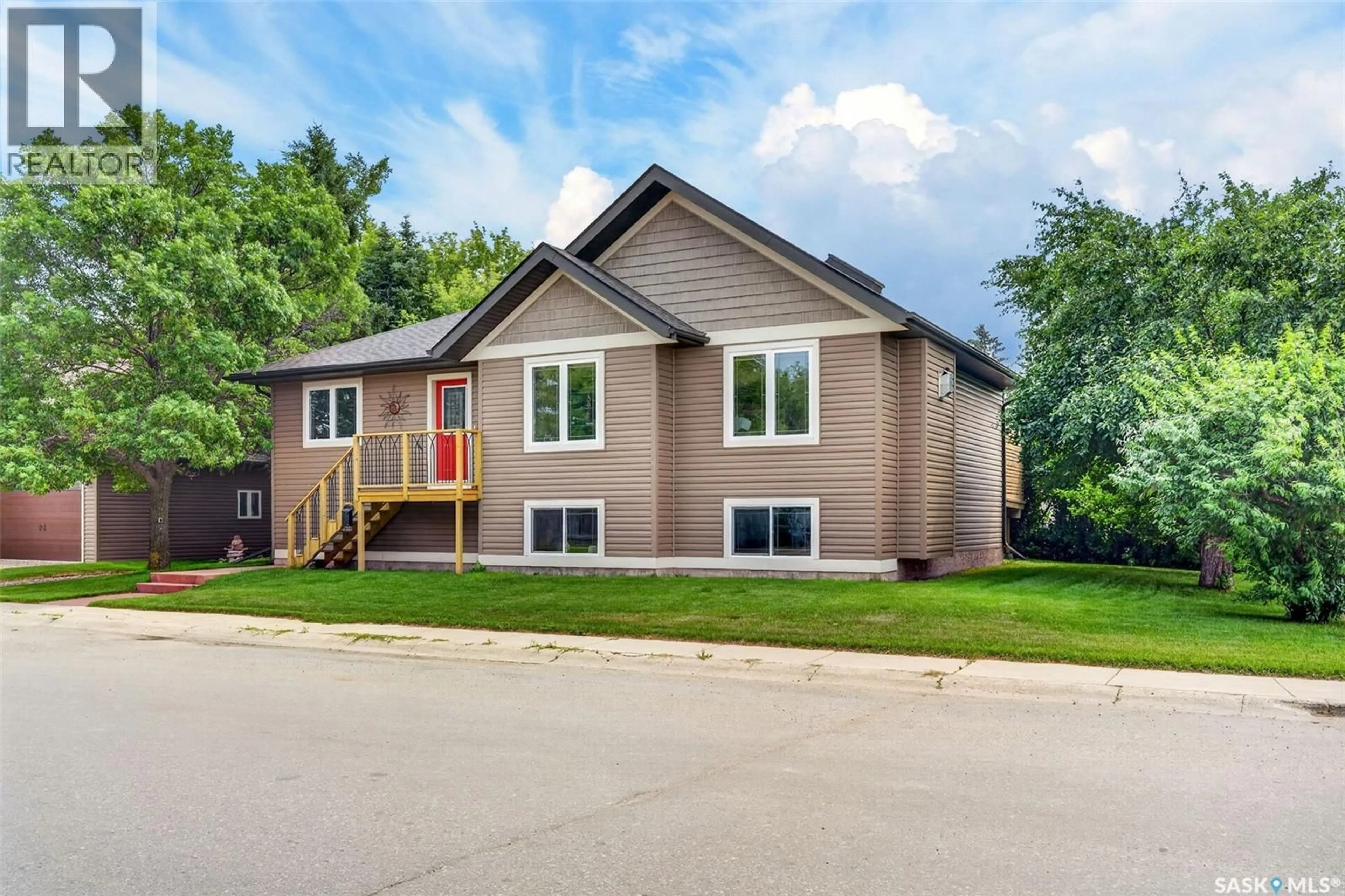 Home with vinyl exterior material, street for 140 10TH STREET, Humboldt Saskatchewan S0K2A0