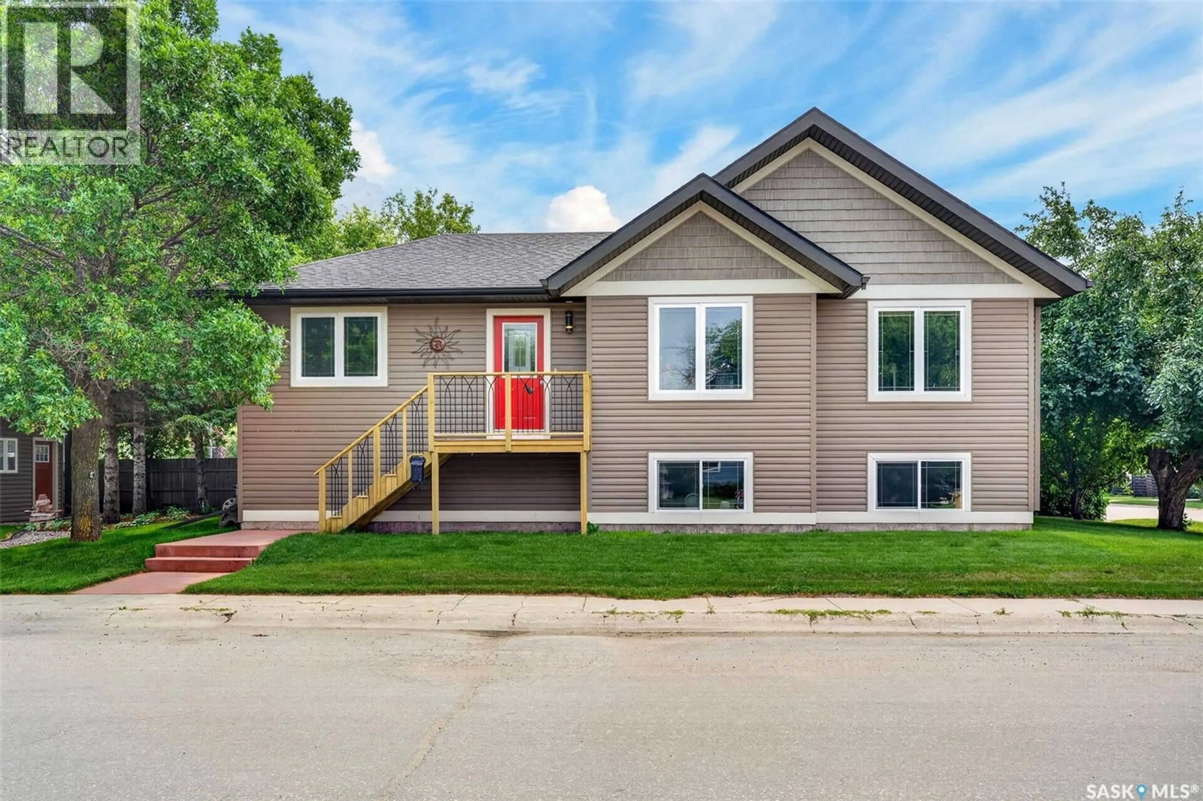 Home with vinyl exterior material, street for 140 10TH STREET, Humboldt Saskatchewan S0K2A0
