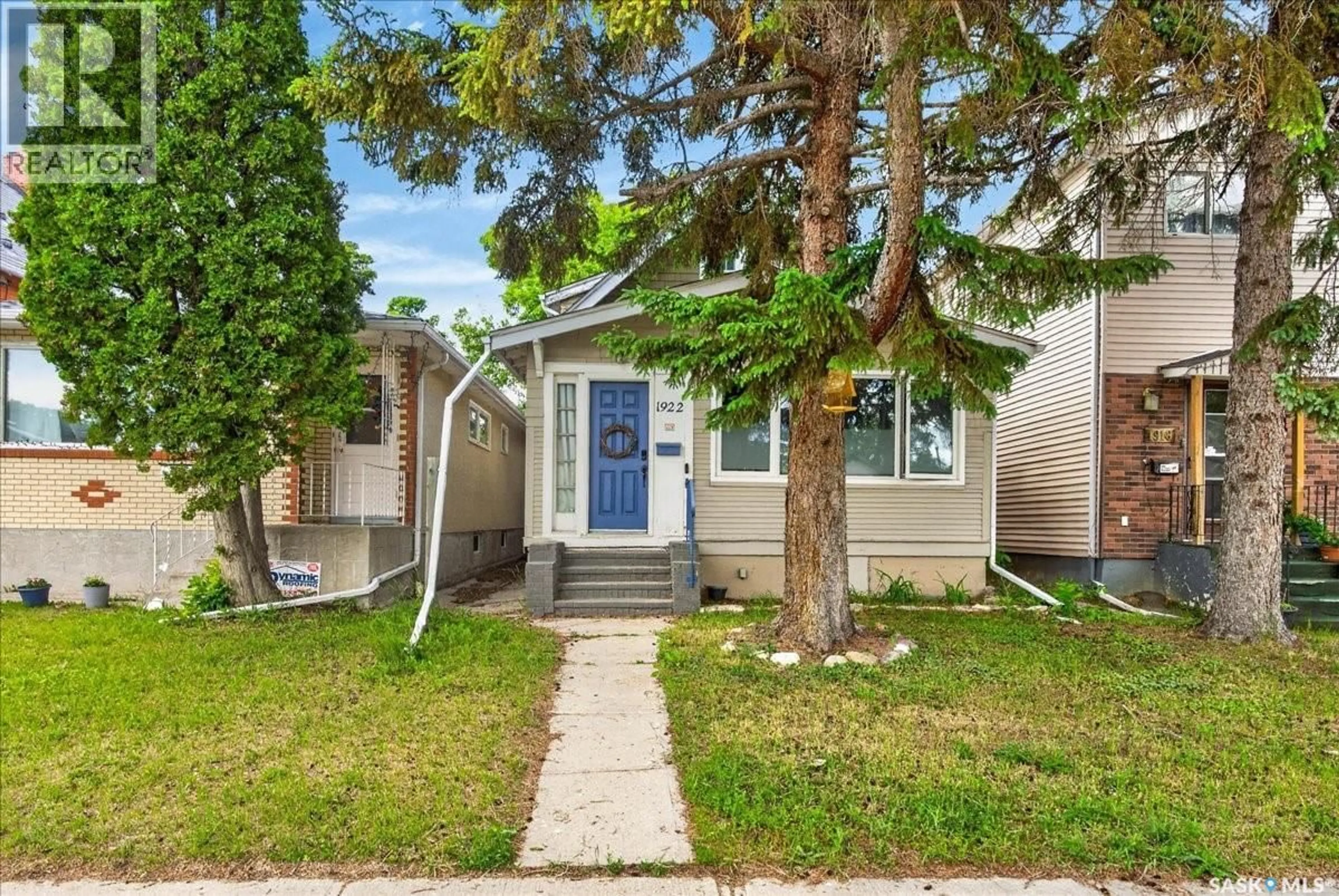 Home with vinyl exterior material, street for 1922 ATKINSON STREET, Regina Saskatchewan S4N3W5