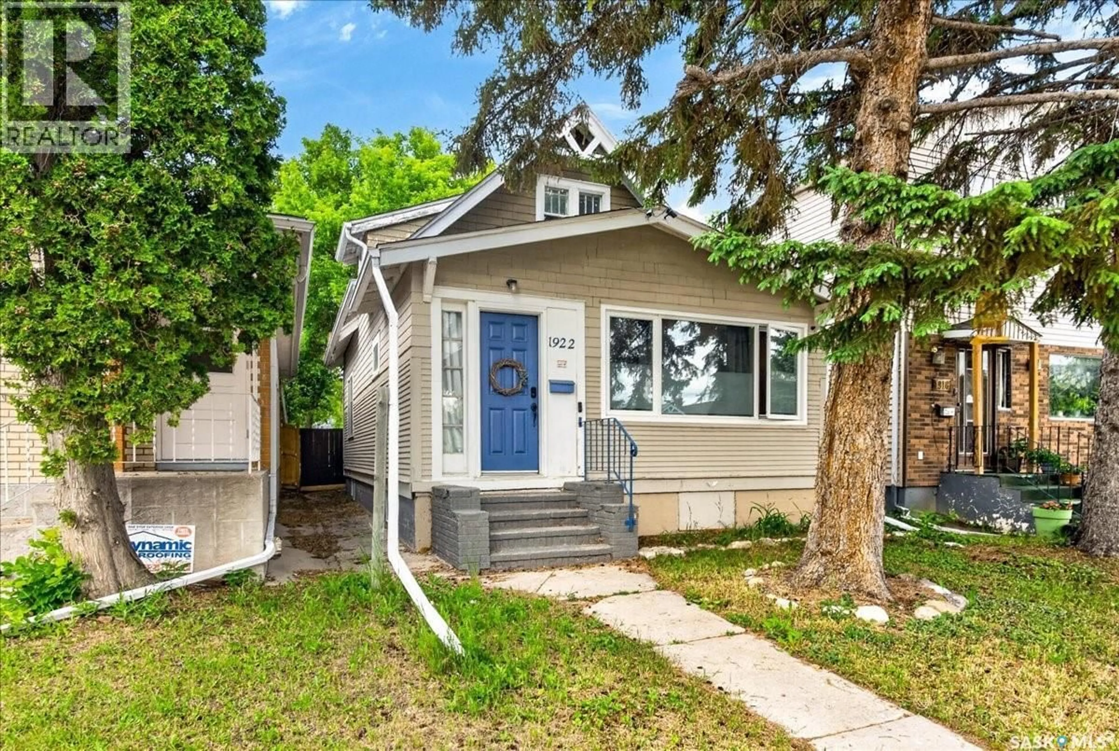 Home with vinyl exterior material, street for 1922 ATKINSON STREET, Regina Saskatchewan S4N3W5