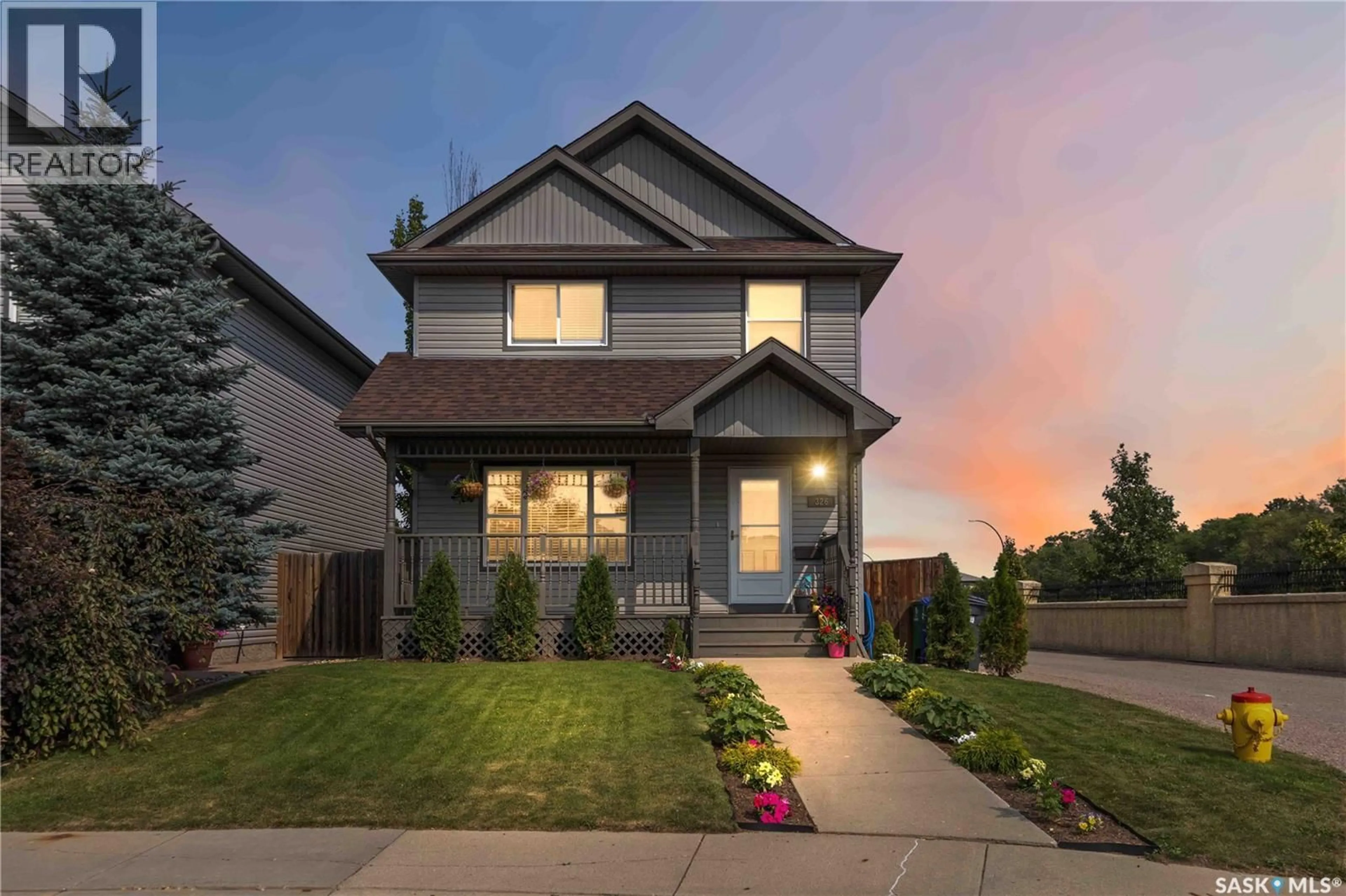 Home with brick exterior material, street for 326 DENHAM COURT, Saskatoon Saskatchewan S7R1E5