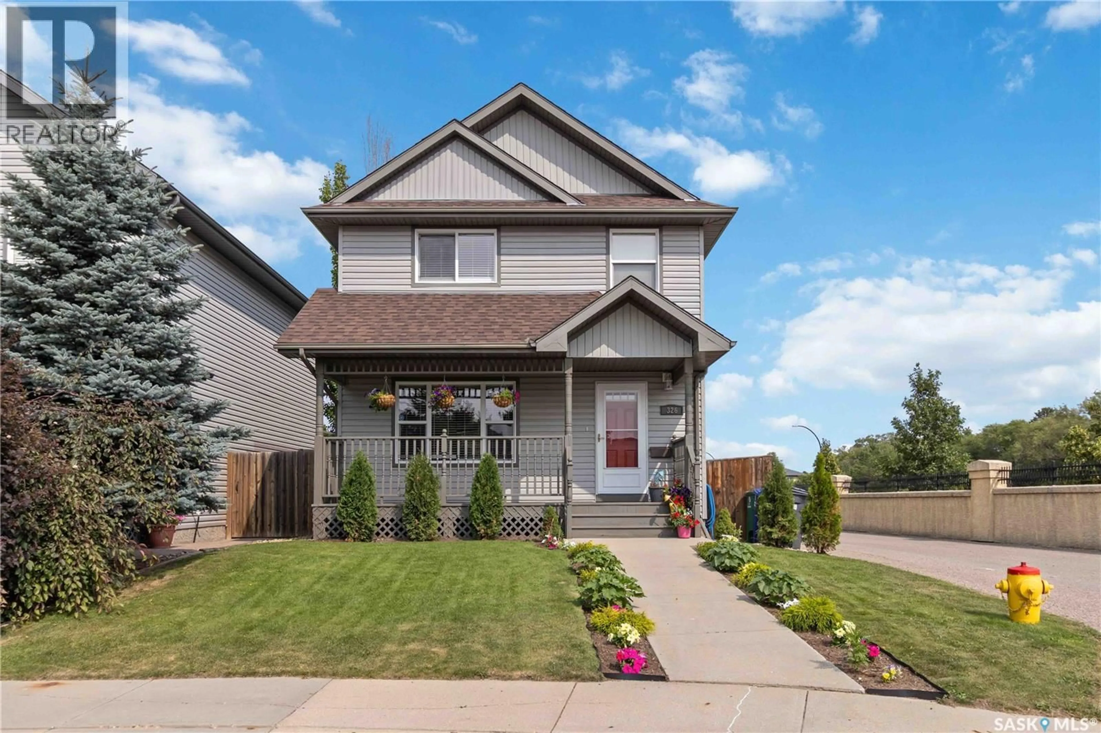 Home with brick exterior material, street for 326 DENHAM COURT, Saskatoon Saskatchewan S7R1E5
