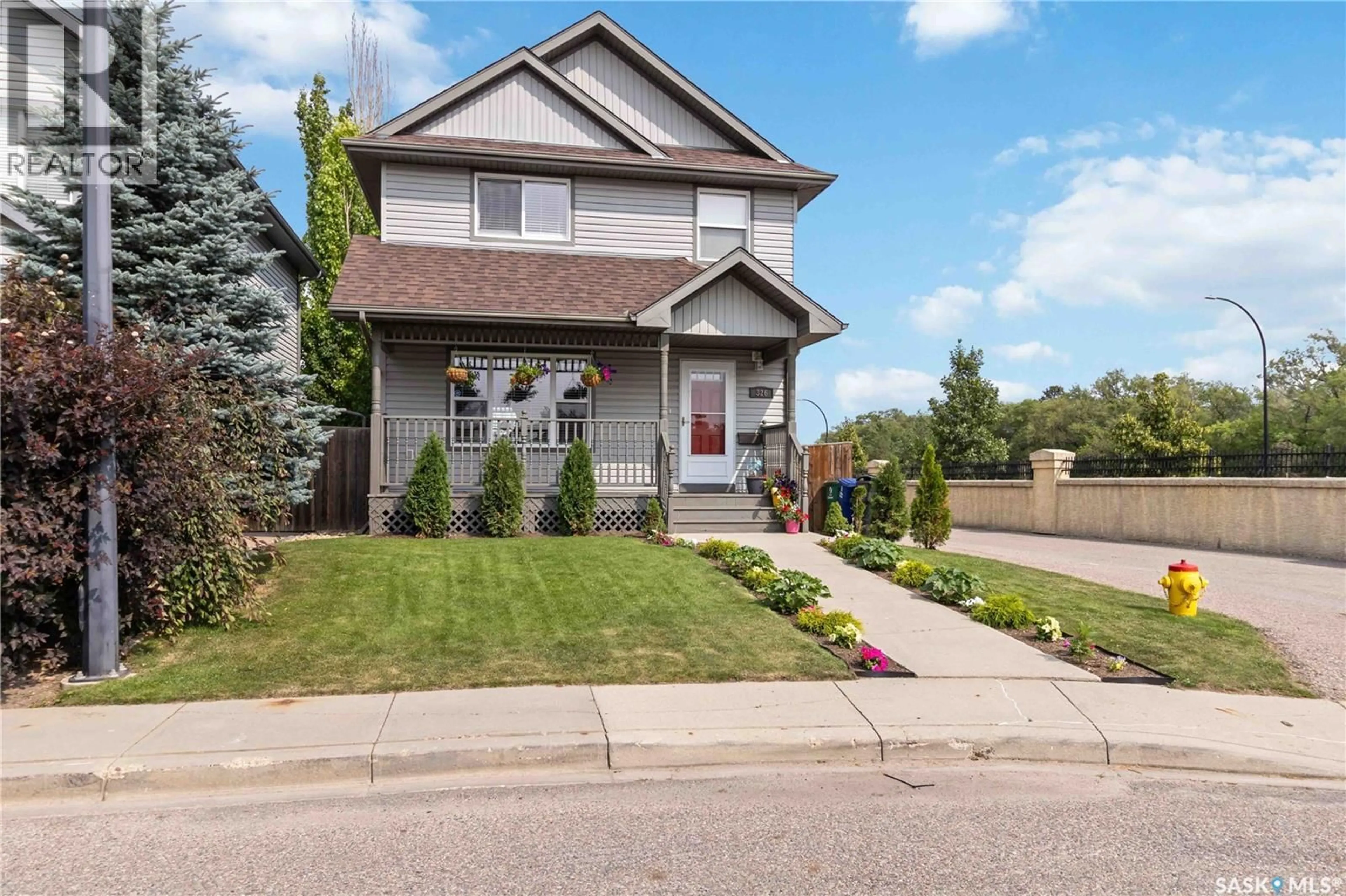 Home with vinyl exterior material, street for 326 DENHAM COURT, Saskatoon Saskatchewan S7R1E5