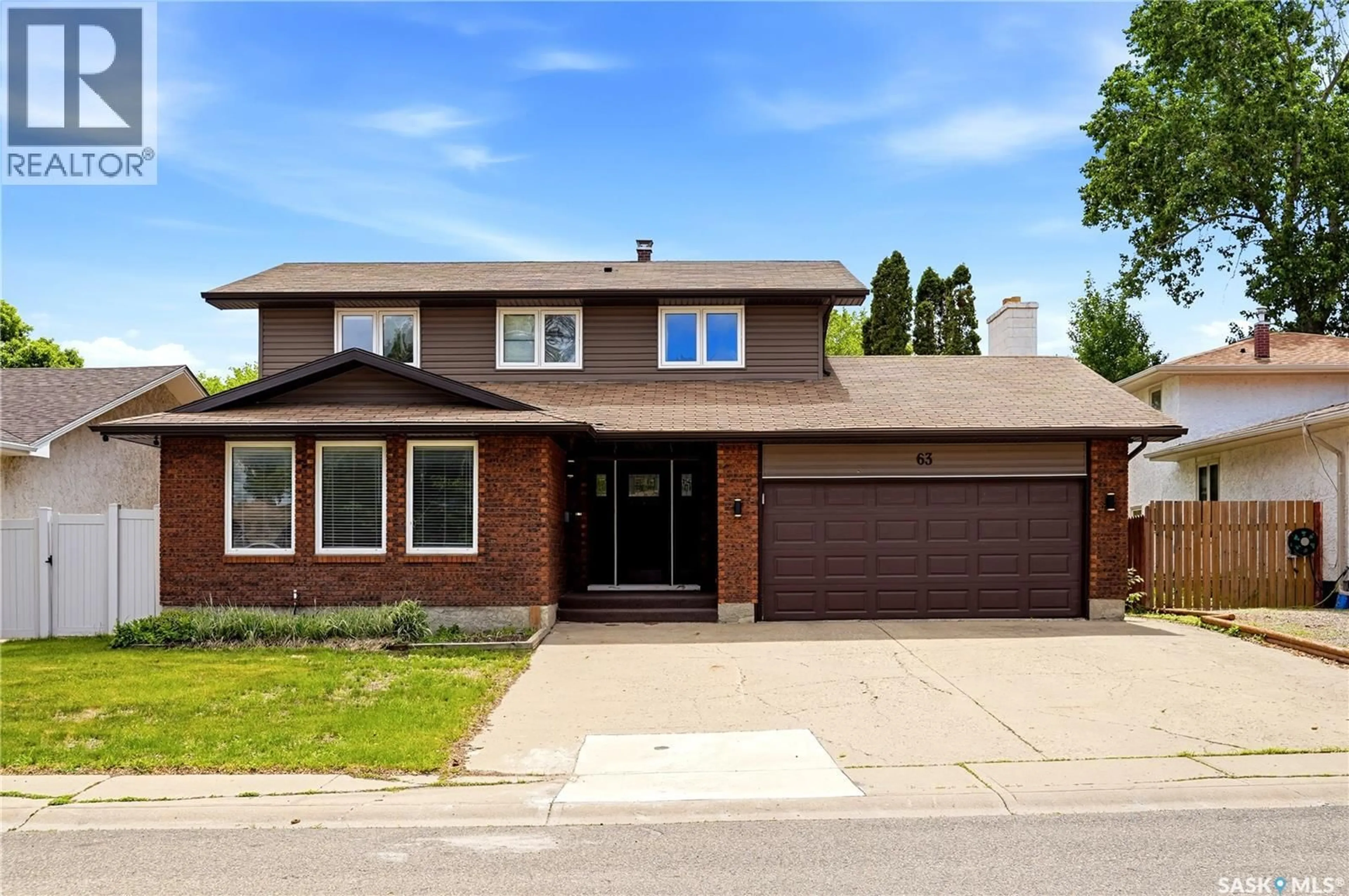 Home with brick exterior material, street for 63 METCALFE ROAD, Regina Saskatchewan S4V0H6