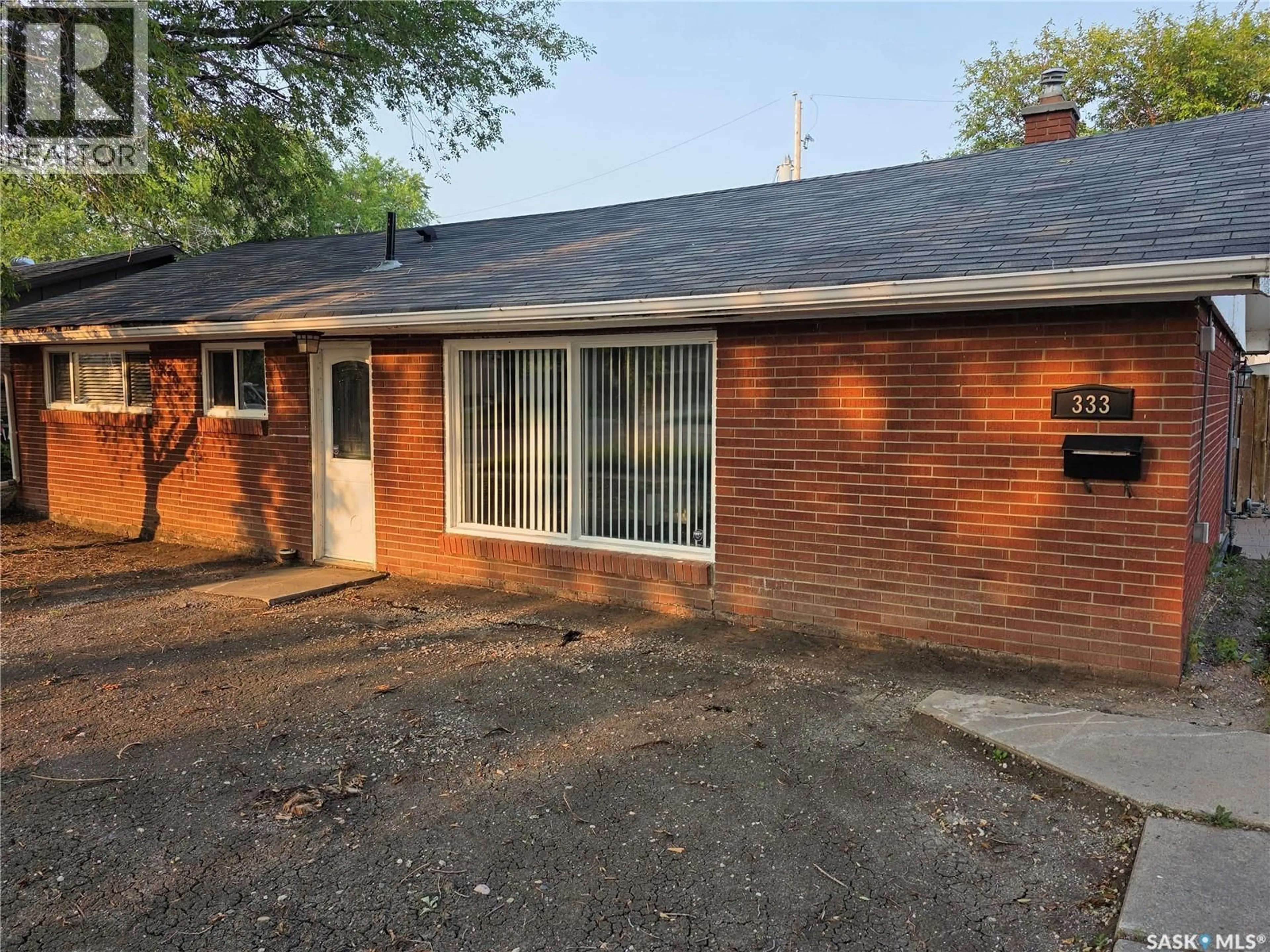 Home with brick exterior material, street for 333 ELPHINSTONE STREET, Regina Saskatchewan S4R3W7