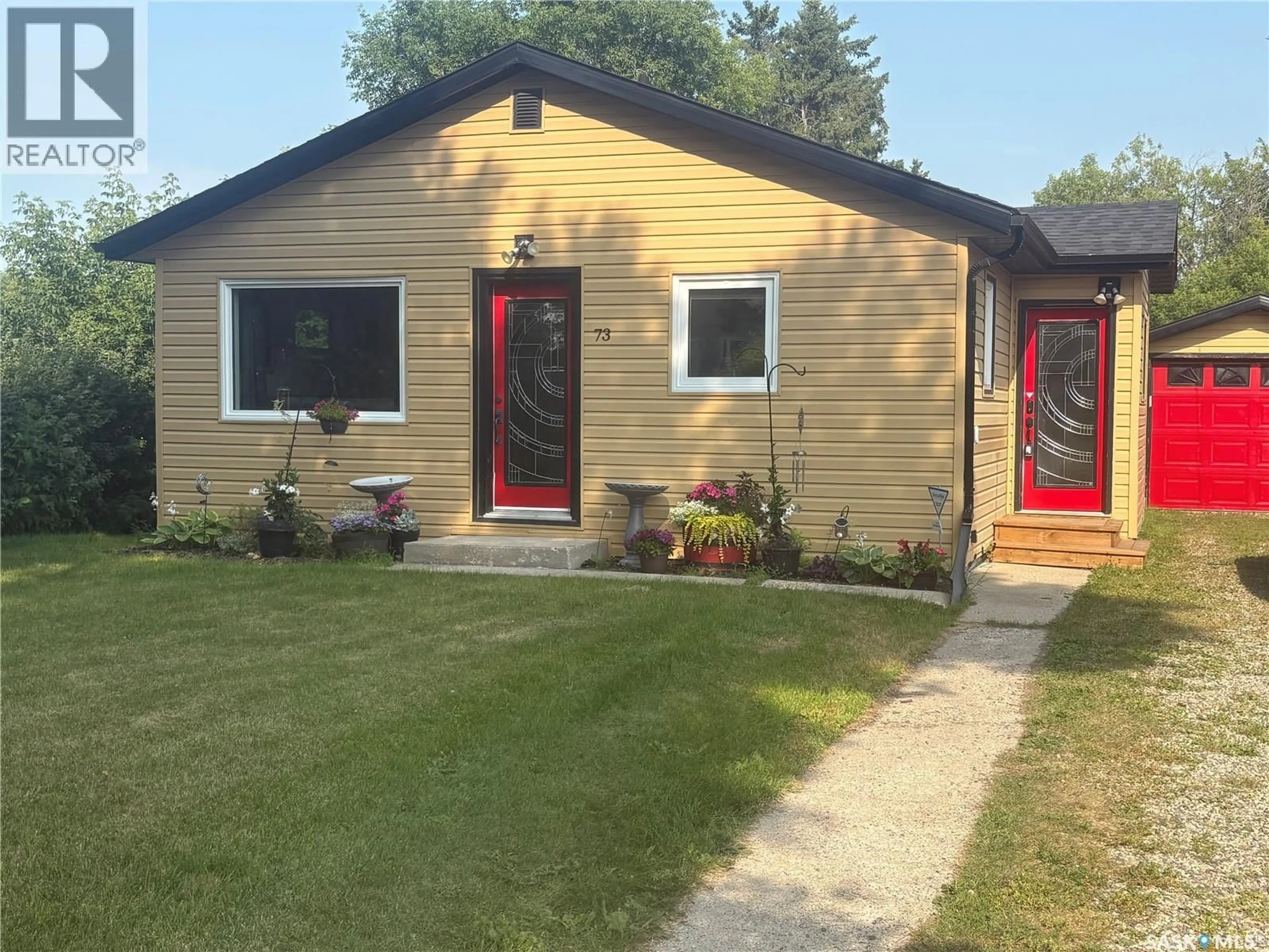 Home with vinyl exterior material, street for 73 FRANKLIN AVENUE, Yorkton Saskatchewan S3N4C6