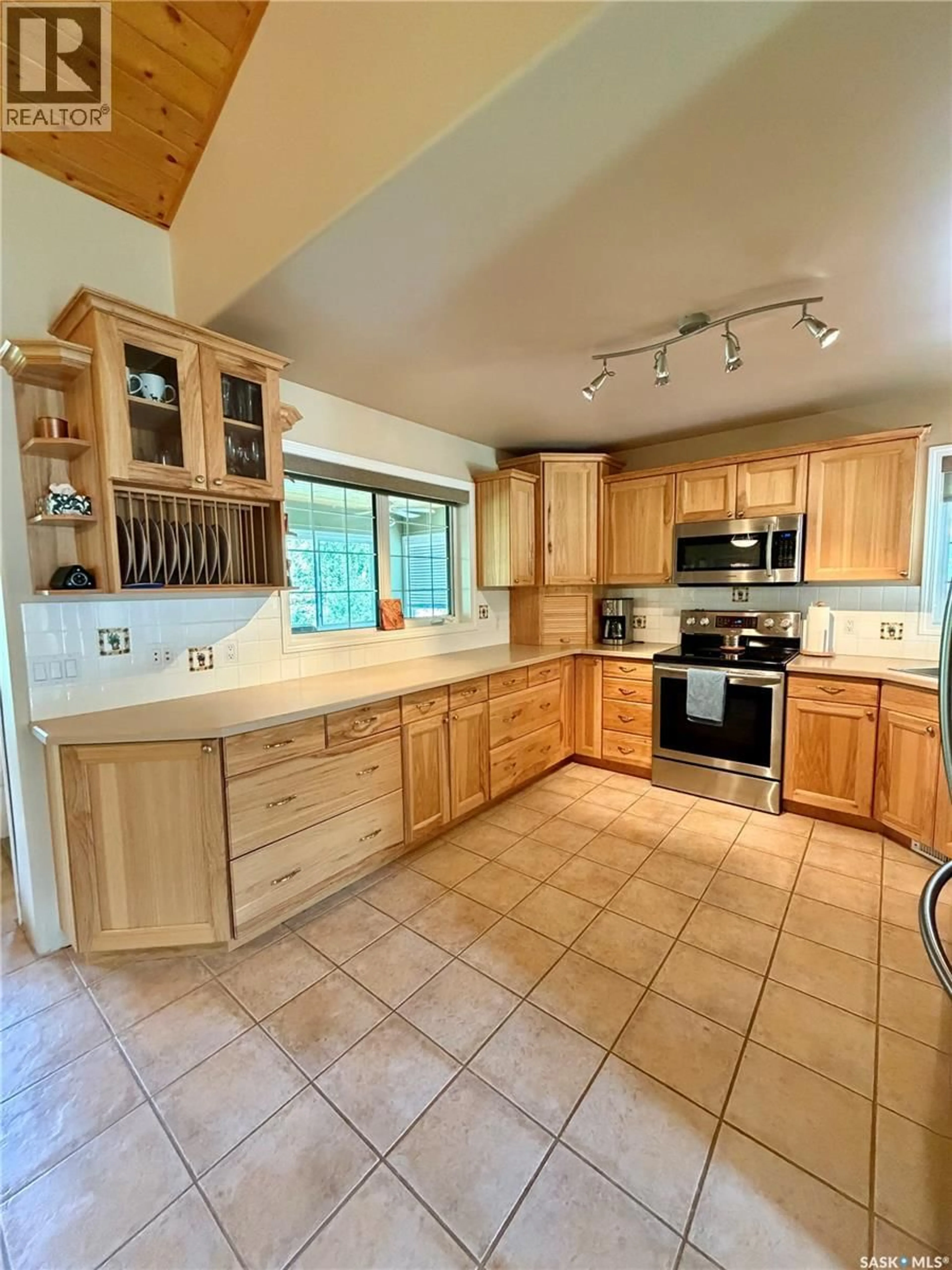 Open concept kitchen, ceramic/tile floor for 60 ESTATES DRIVE, Elk Ridge Saskatchewan S0J0N0