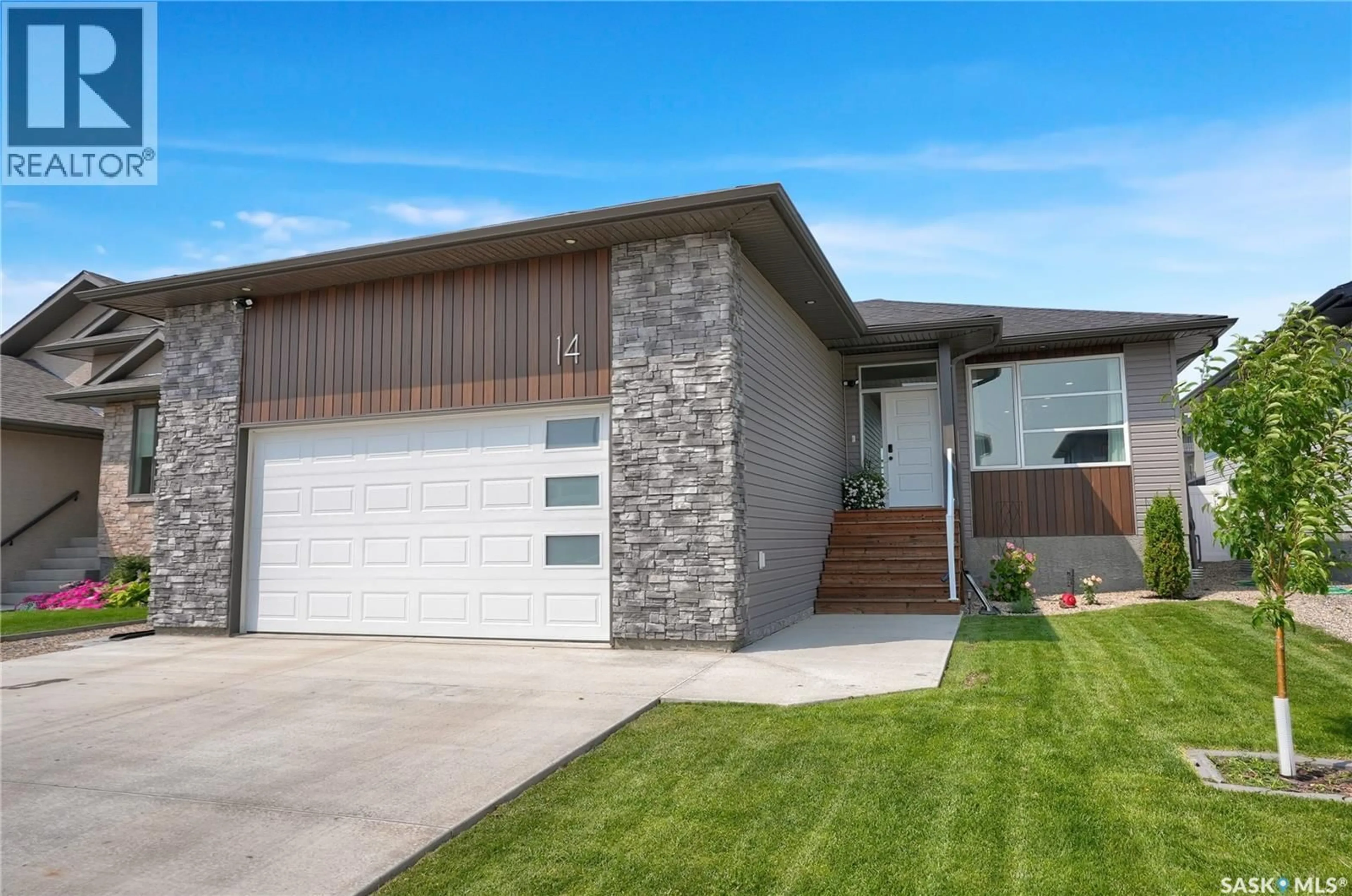 Home with brick exterior material, street for 14 CLUNIE COURT, Moose Jaw Saskatchewan S6J0E3