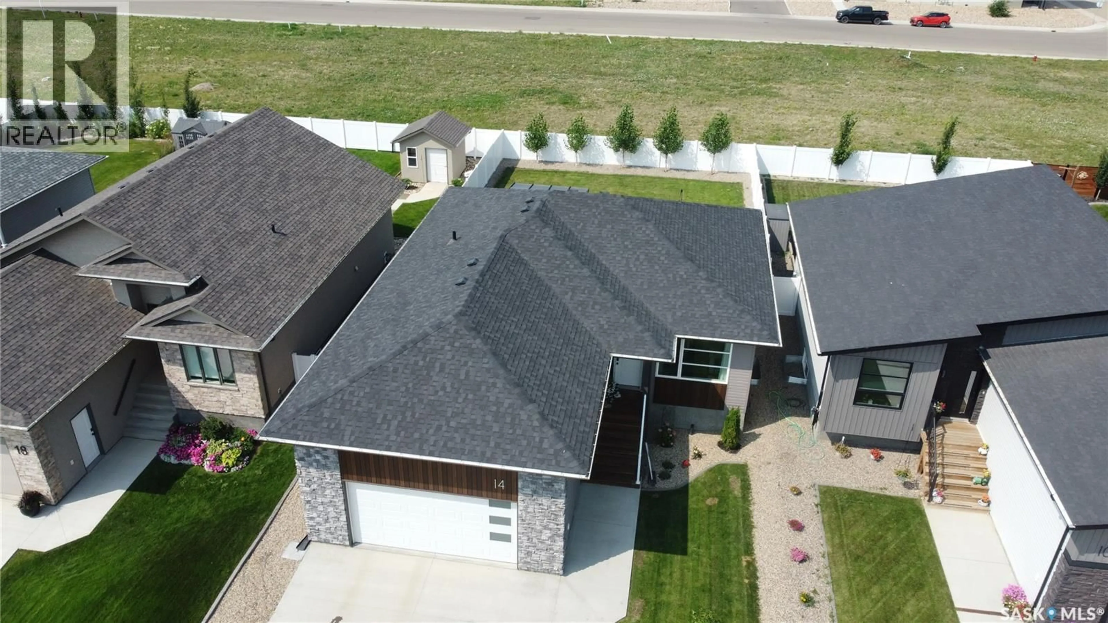 A pic from outside/outdoor area/front of a property/back of a property/a pic from drone, unknown for 14 CLUNIE COURT, Moose Jaw Saskatchewan S6J0E3