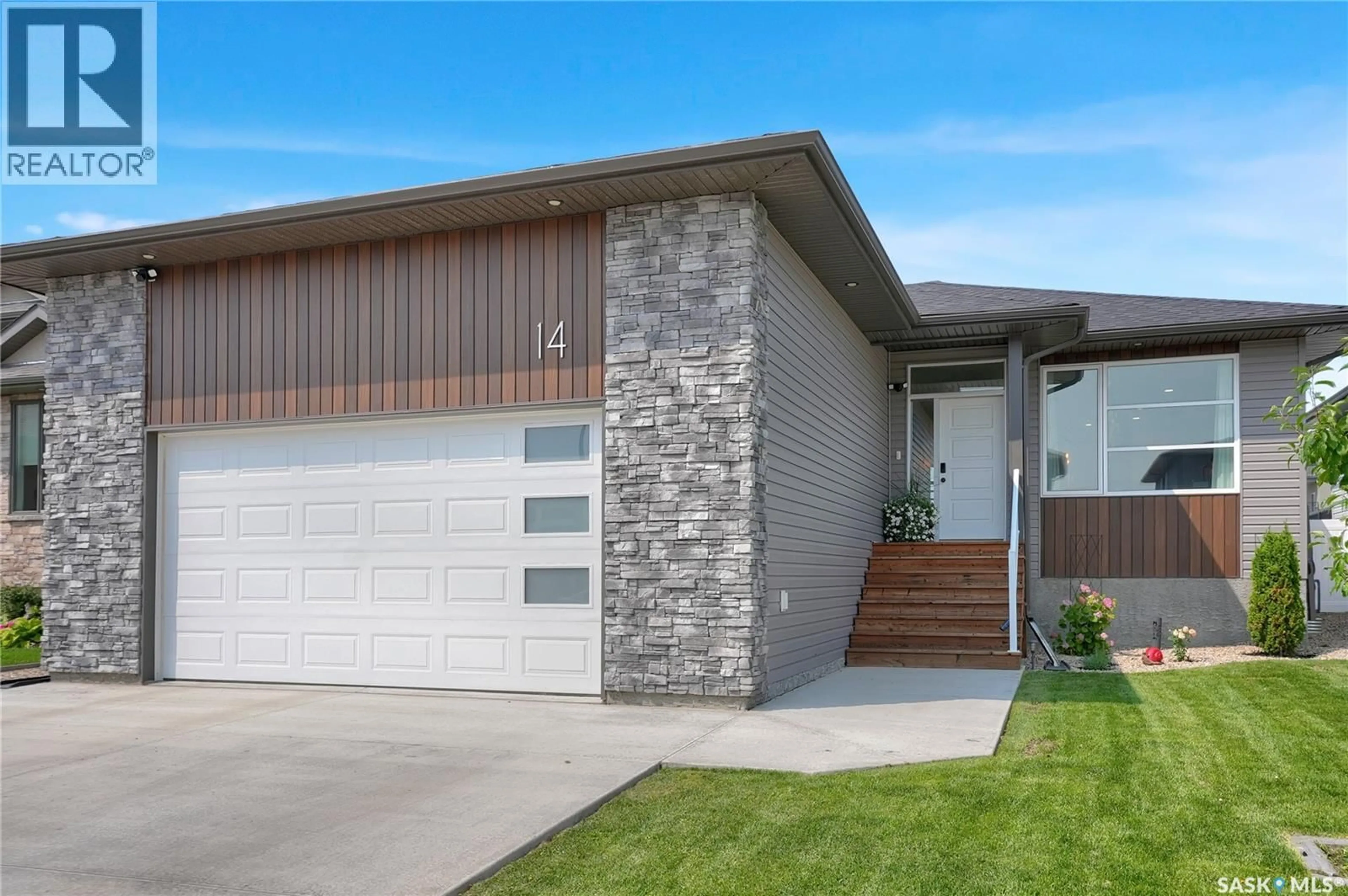 Home with brick exterior material, street for 14 CLUNIE COURT, Moose Jaw Saskatchewan S6J0E3