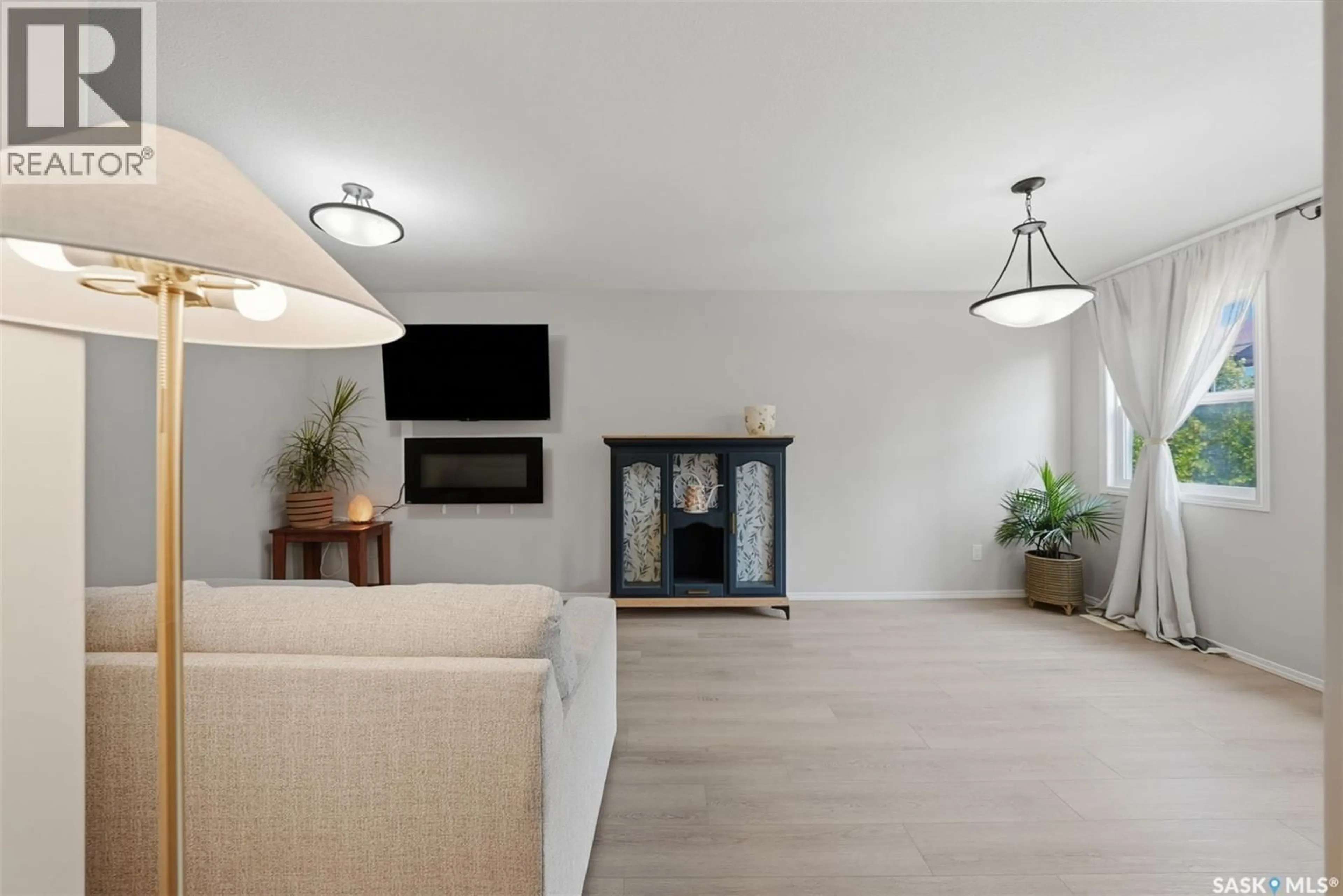 Living room with furniture, unknown for 507 150 LANGLOIS WAY, Saskatoon Saskatchewan S7T0L3