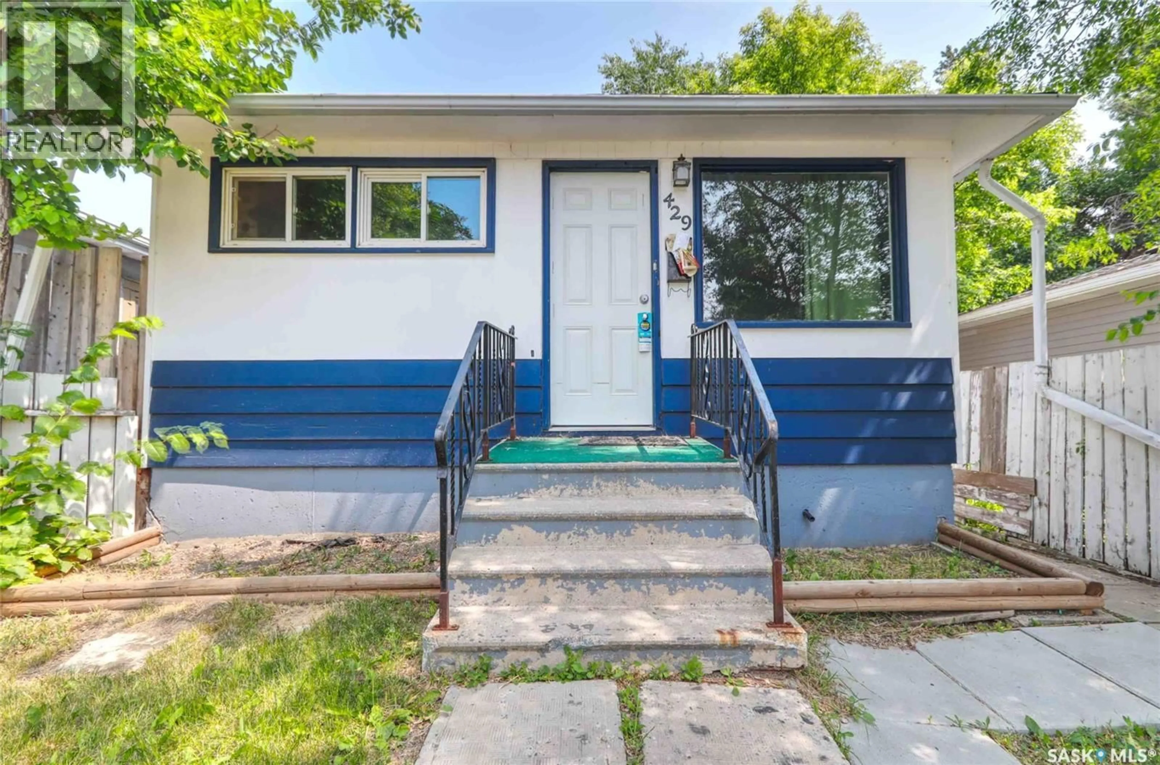 Home with vinyl exterior material, street for 429 ST JOHN STREET, Regina Saskatchewan S4R1R4