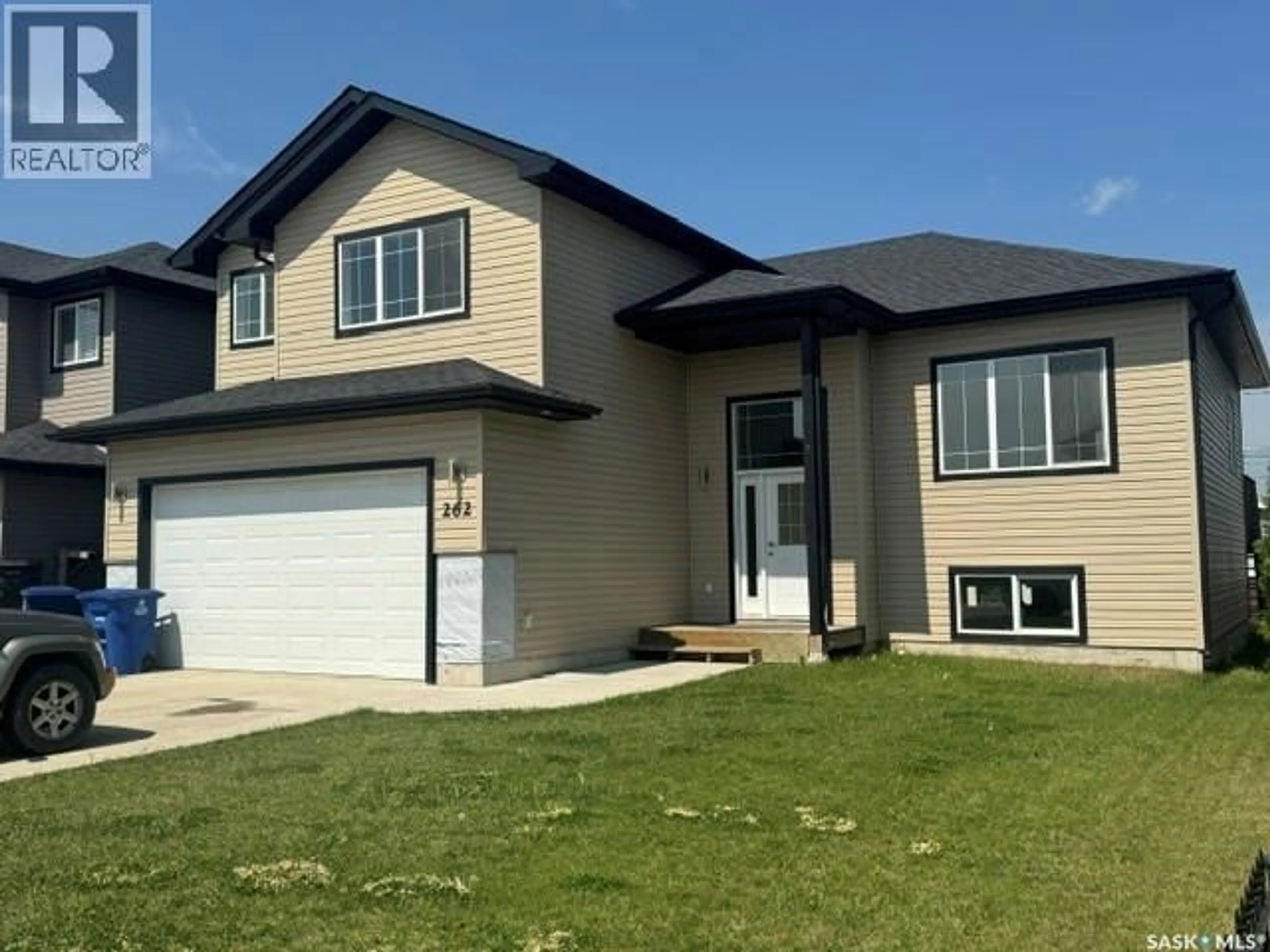 Home with vinyl exterior material, street for 262 15TH STREET, Battleford Saskatchewan S0M0E0
