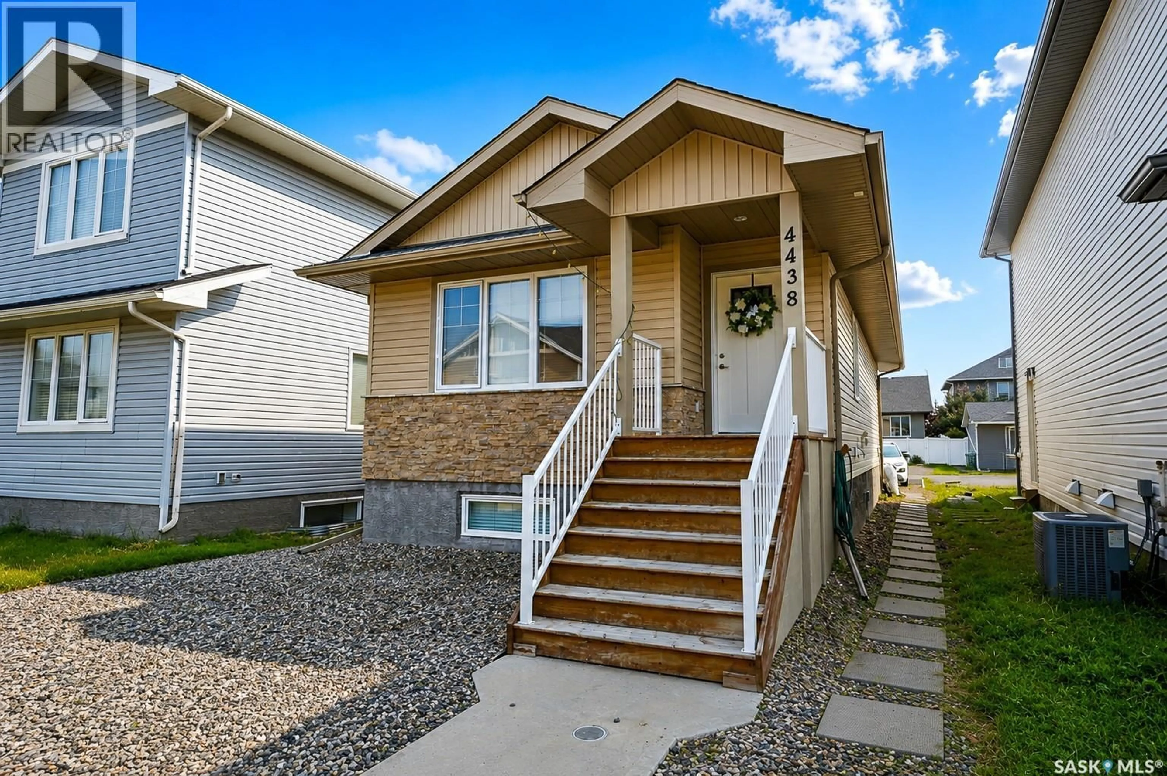 Home with vinyl exterior material, street for 4438 SHERIDAN STREET, Regina Saskatchewan S4W0K5