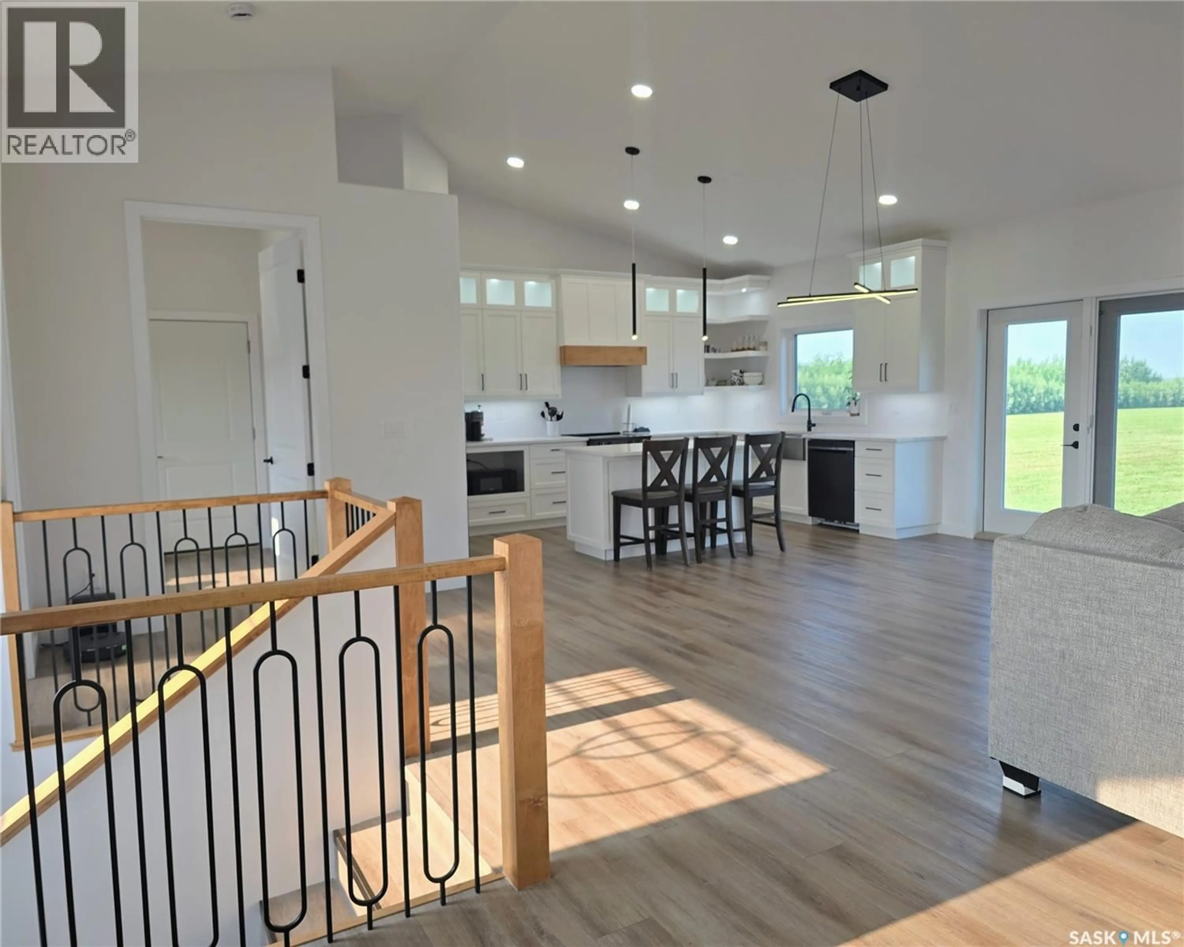 Open concept kitchen, wood/laminate floor for 8 GEORGE DRIVE, Humboldt Rm No. 370 Saskatchewan S0K2A0