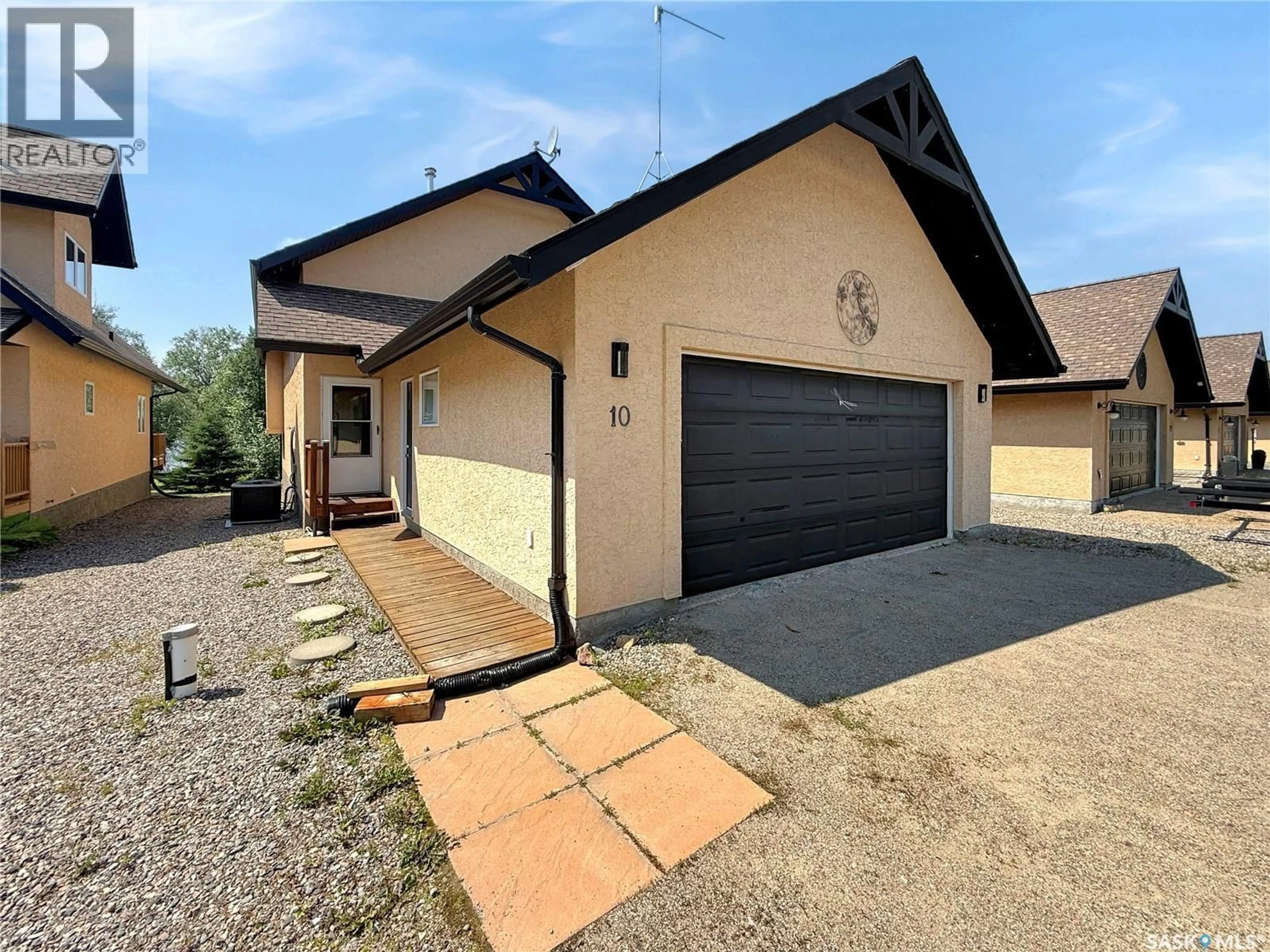 Home with brick exterior material, street for 10 SUNSET WAY, Candle Lake Saskatchewan S0J3E0