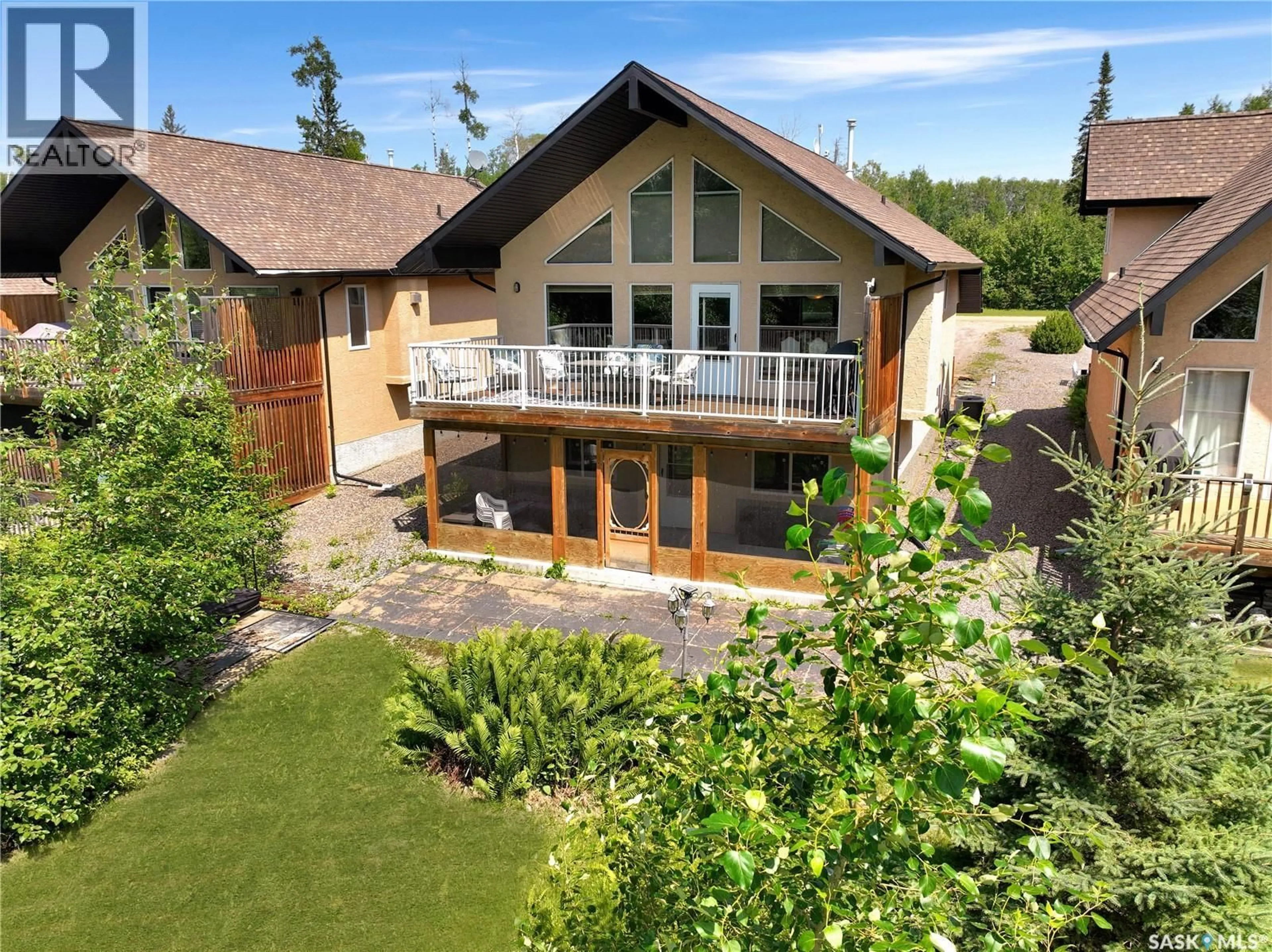 A pic from outside/outdoor area/front of a property/back of a property/a pic from drone, unknown for 10 SUNSET WAY, Candle Lake Saskatchewan S0J3E0