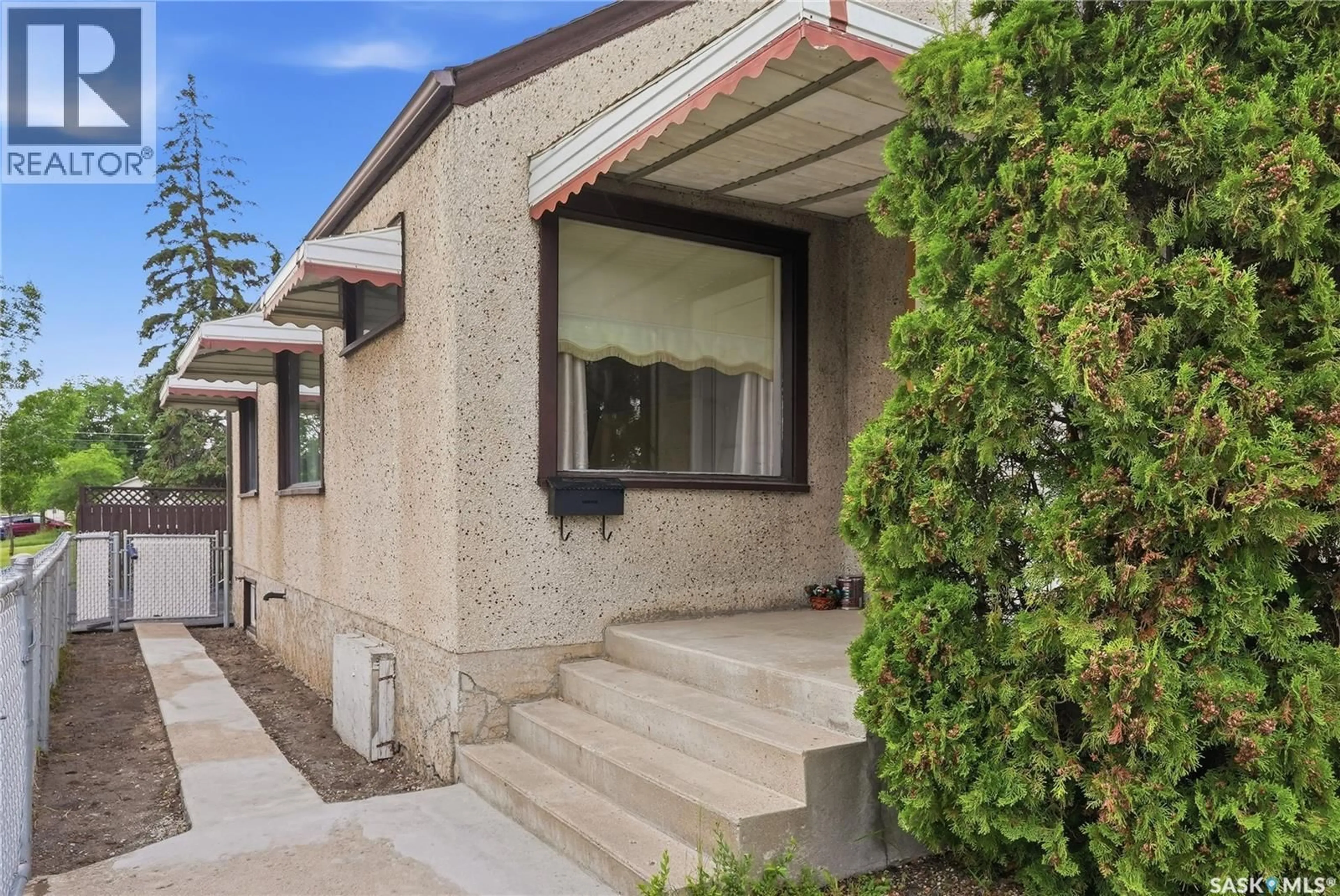 Home with brick exterior material, street for 201 P AVENUE, Saskatoon Saskatchewan S7L2V6