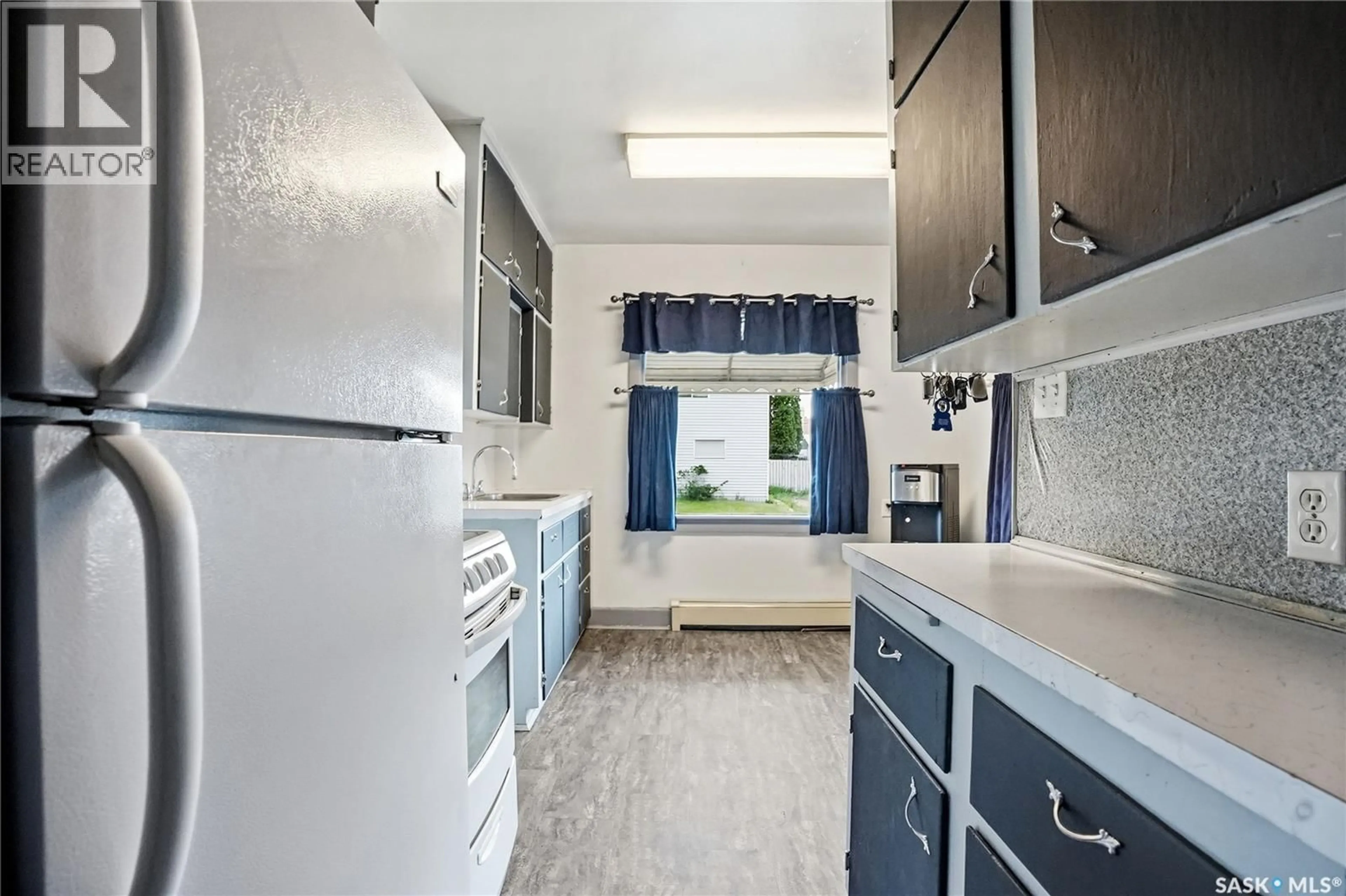 Standard kitchen, ceramic/tile floor for 201 P AVENUE, Saskatoon Saskatchewan S7L2V6