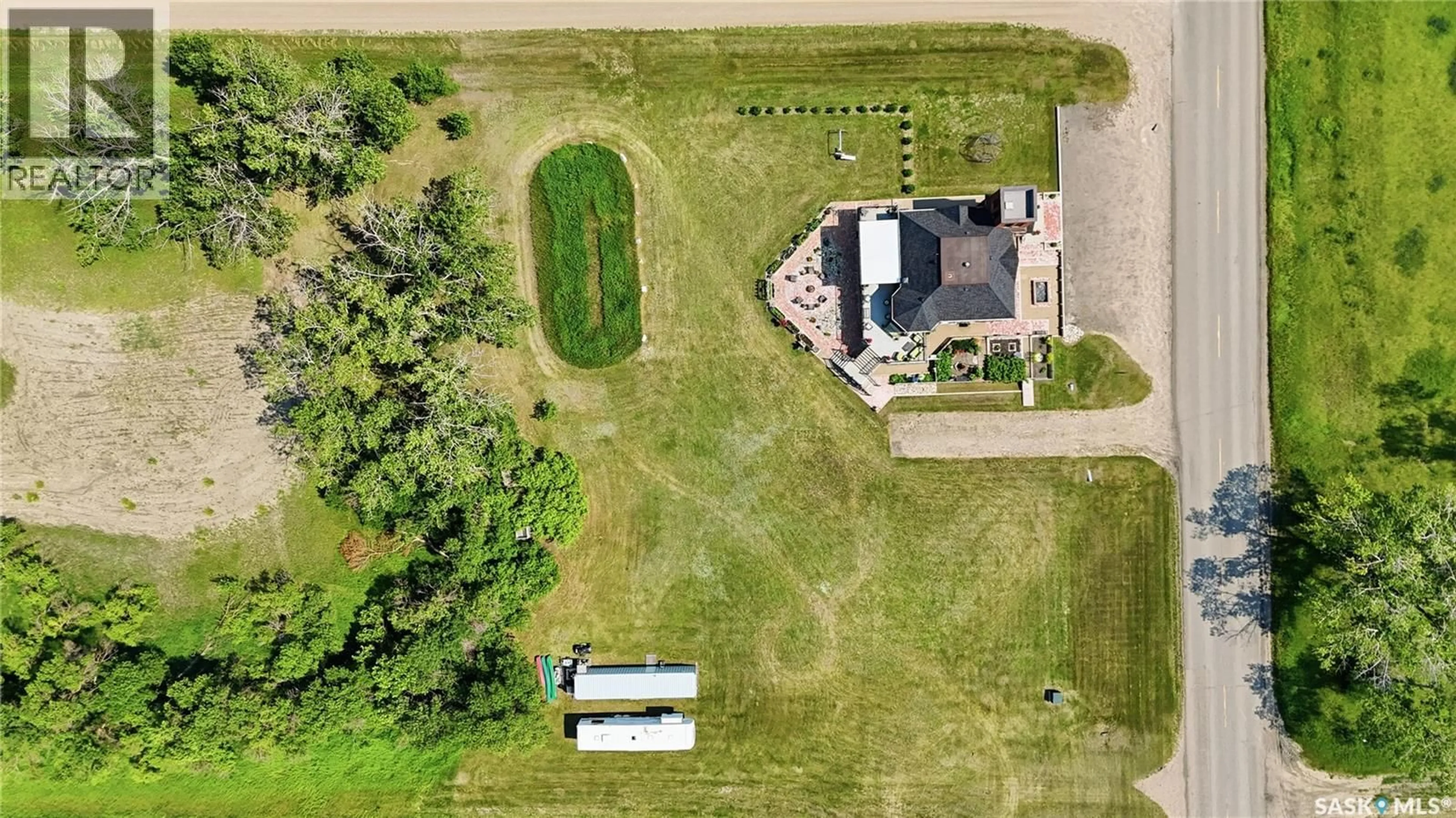 A pic from outside/outdoor area/front of a property/back of a property/a pic from drone, building for MICKLEBOROUGH ACREAGE, Lumsden Rm No. 189 Saskatchewan S4P2Z1