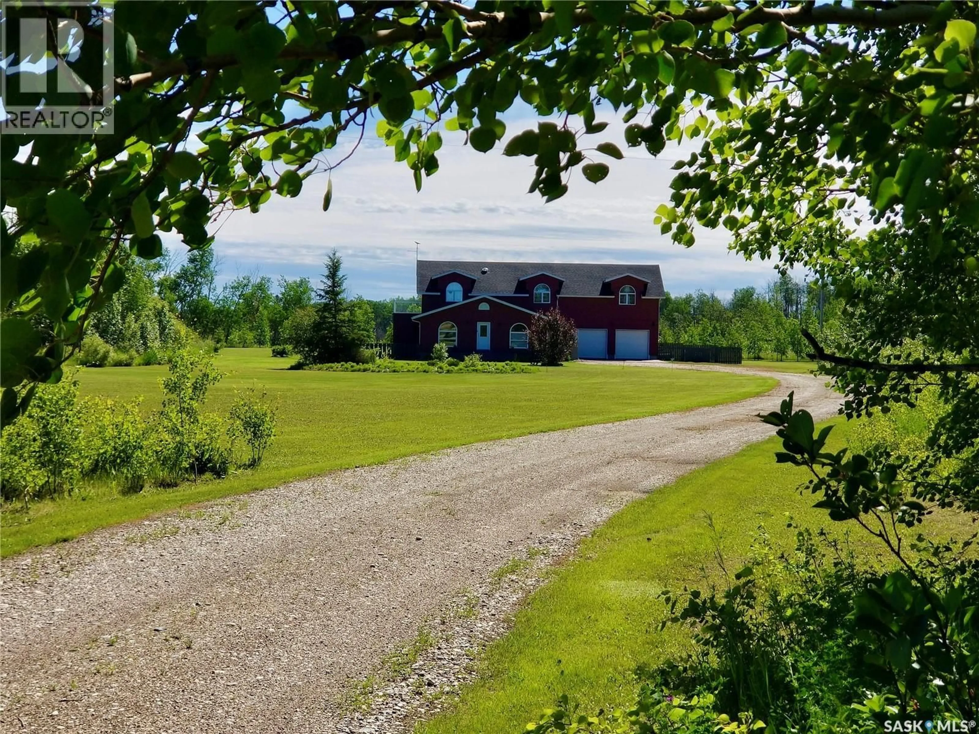A pic from outside/outdoor area/front of a property/back of a property/a pic from drone, mountain view for 11 HWY 9, Hudson Bay Rm No. 394 Saskatchewan S0E0Y0