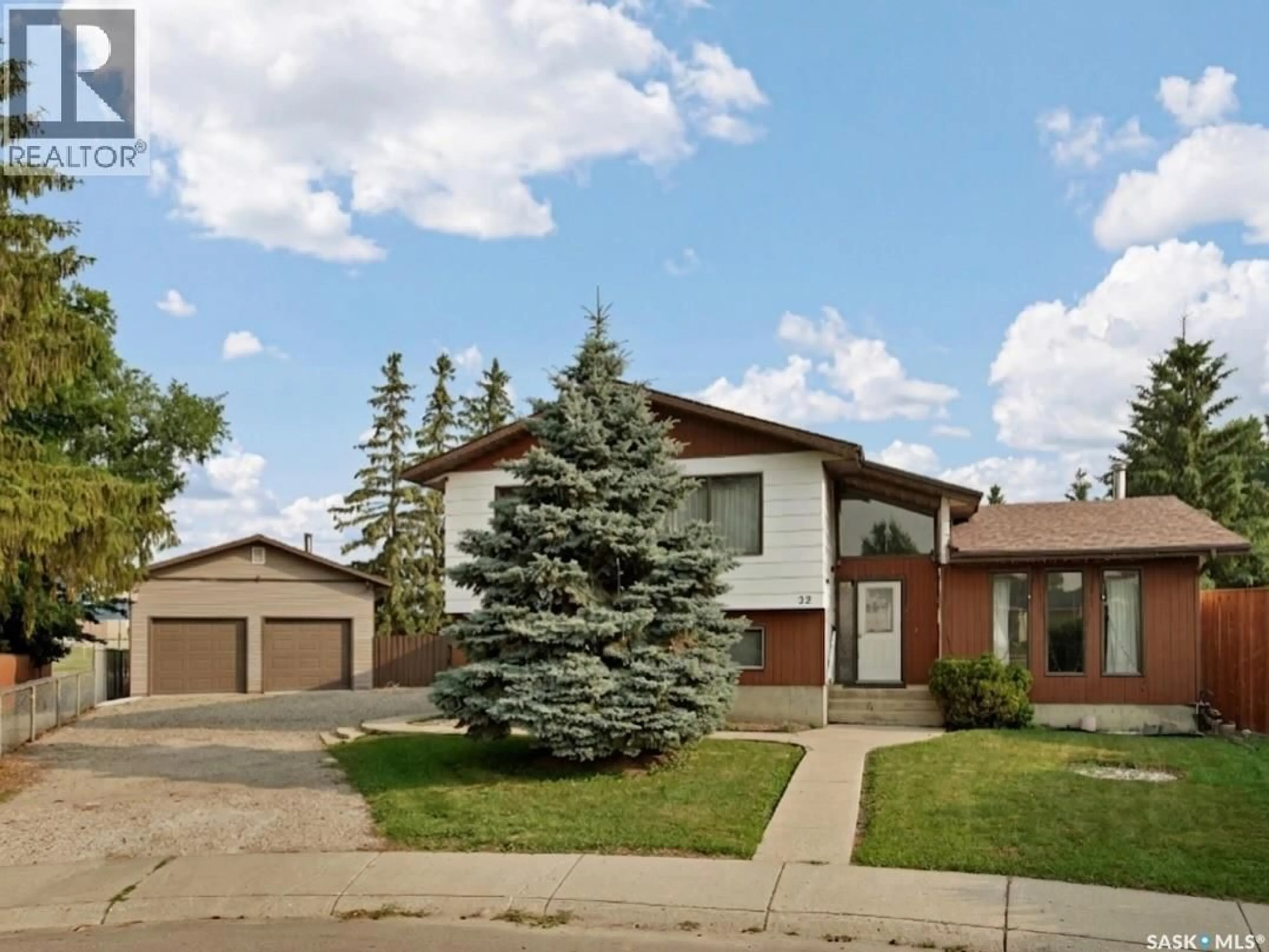 Home with brick exterior material, street for 22 BLUE PLACE, Saskatoon Saskatchewan S7M4R9