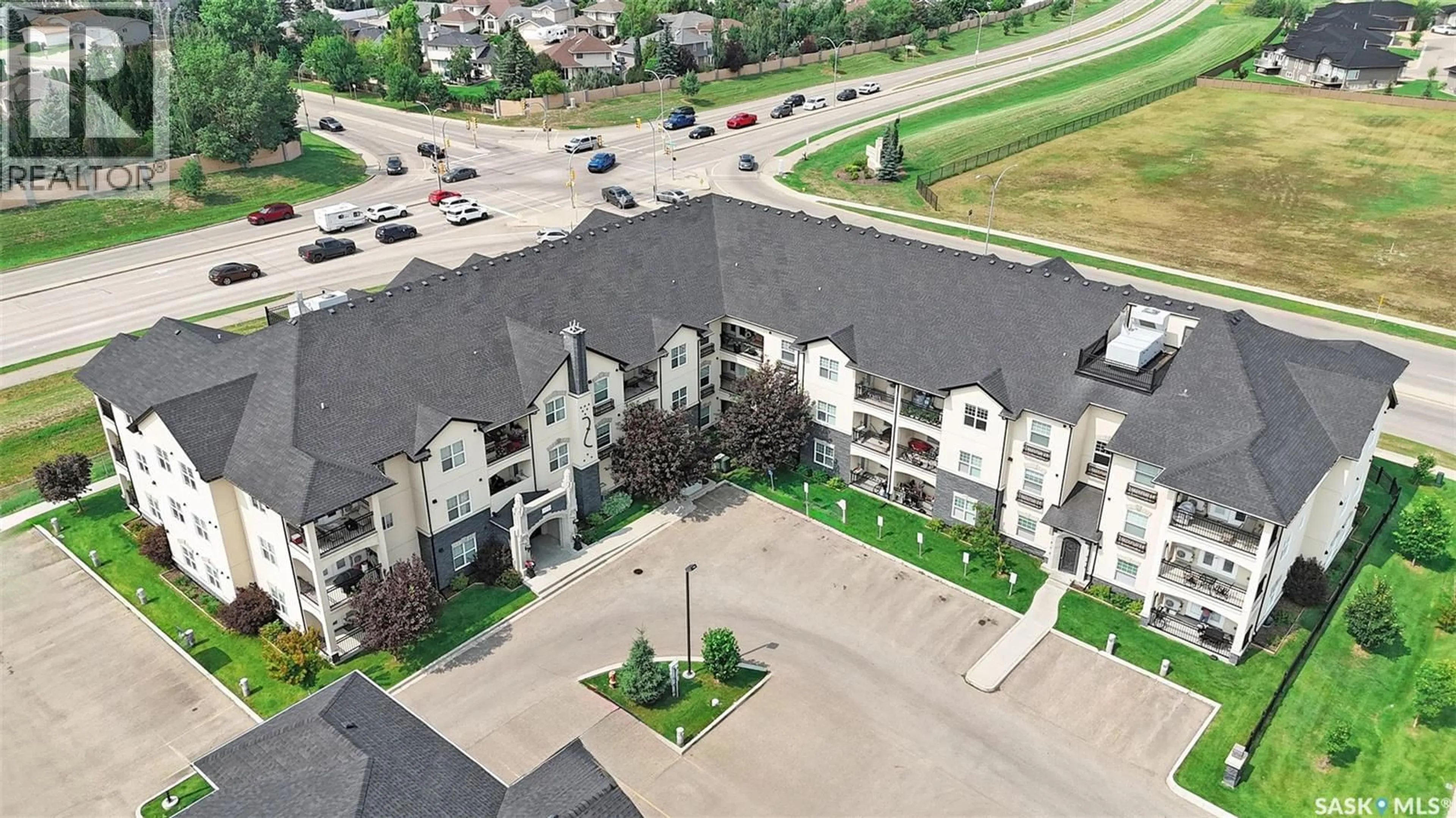A pic from outside/outdoor area/front of a property/back of a property/a pic from drone, unknown for 110 - 102 PHELPS WAY, Saskatoon Saskatchewan S7V0K5