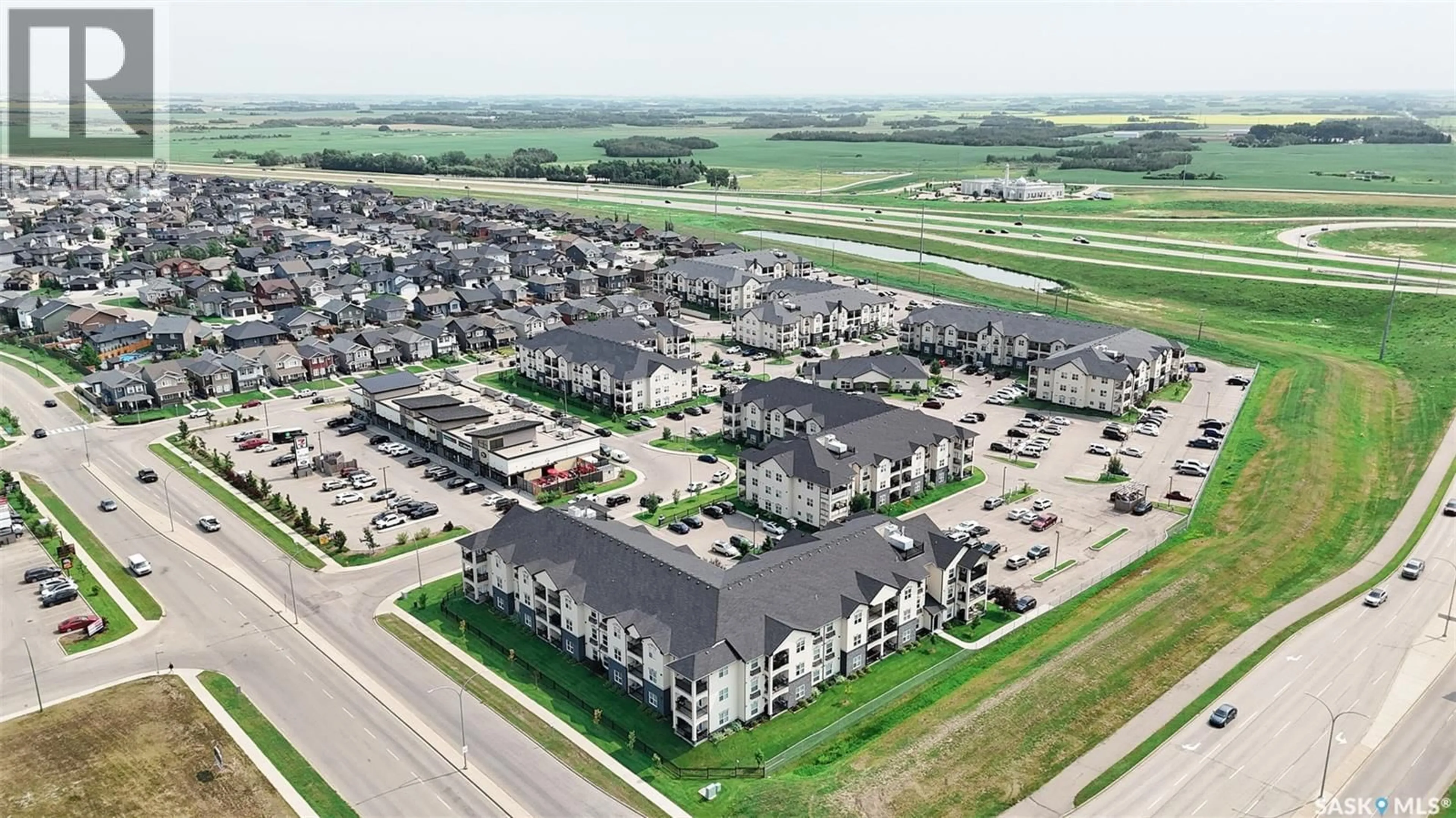 A pic from outside/outdoor area/front of a property/back of a property/a pic from drone, street for 110 - 102 PHELPS WAY, Saskatoon Saskatchewan S7V0K5
