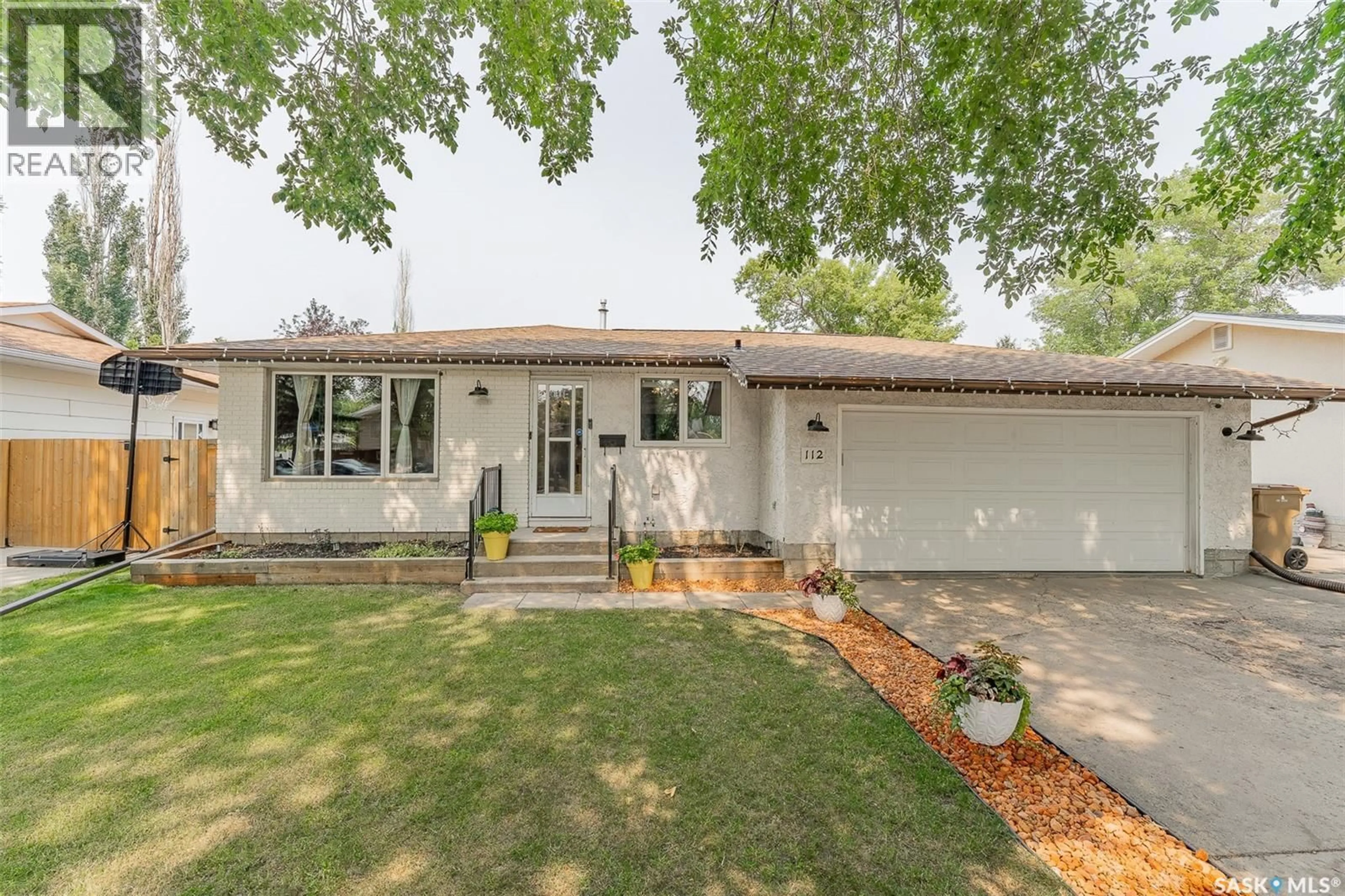 Home with brick exterior material, street for 112 TREMAINE AVENUE, Regina Saskatchewan S4R6S4