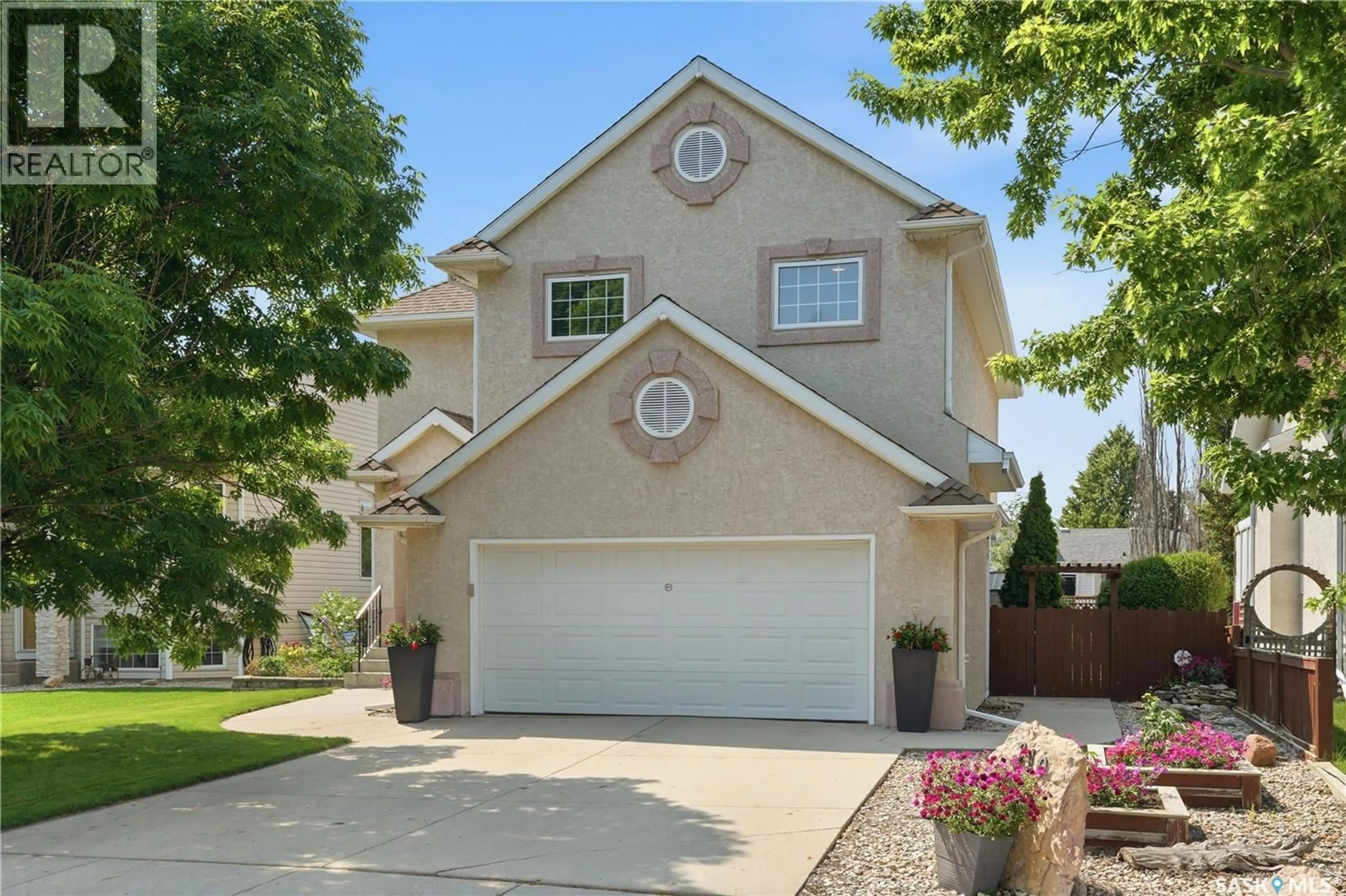 Home with vinyl exterior material, street for 210 FAIRBROTHER TERRACE, Saskatoon Saskatchewan S7S1H9