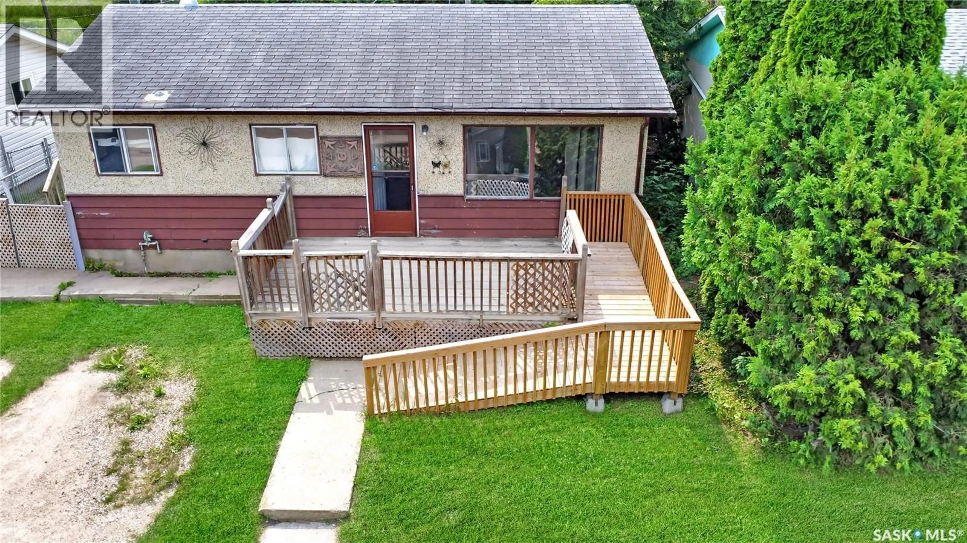 A pic from outside/outdoor area/front of a property/back of a property/a pic from drone, street for 1787 13TH STREET, Prince Albert Saskatchewan S6V3K2