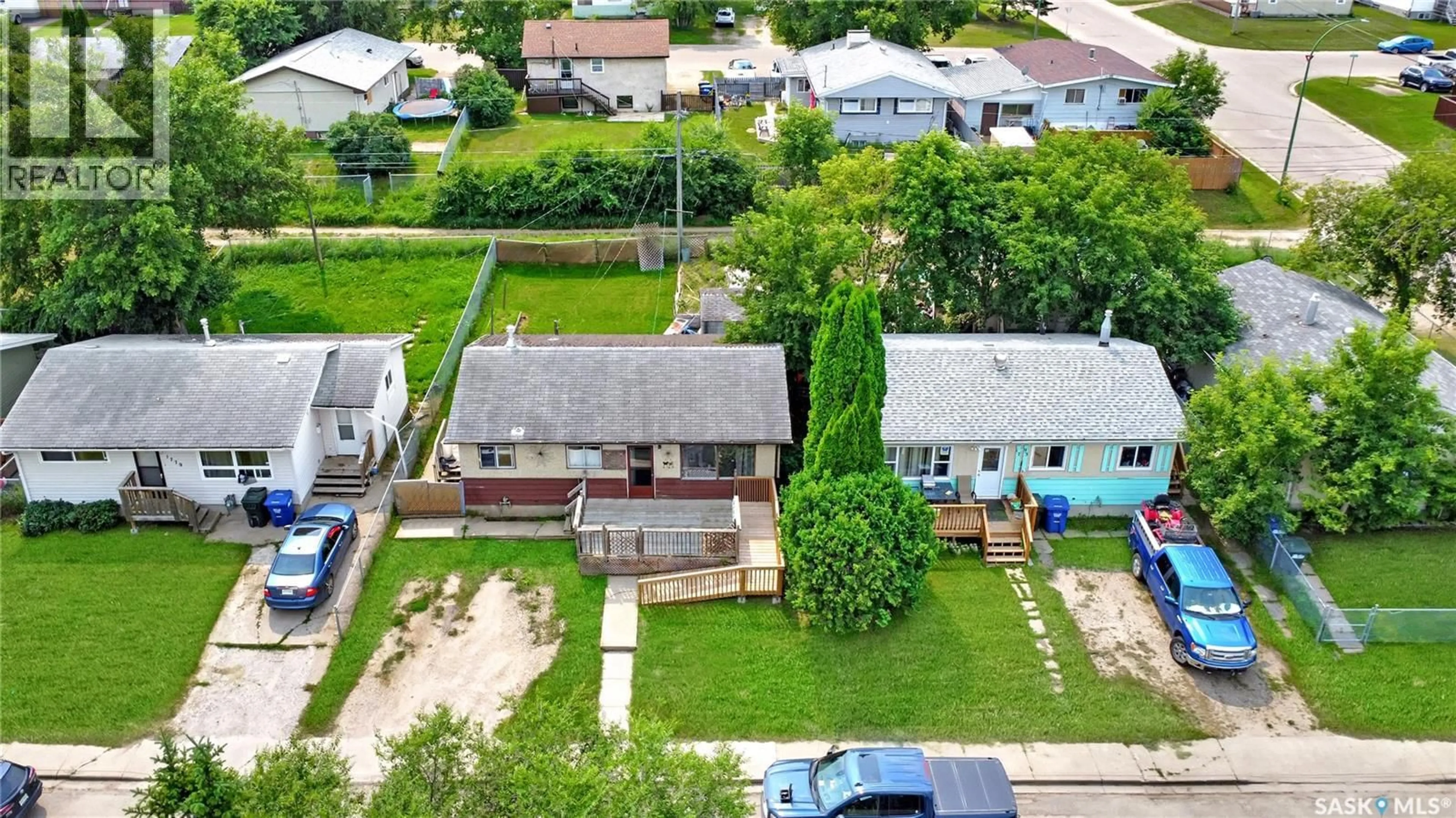 A pic from outside/outdoor area/front of a property/back of a property/a pic from drone, street for 1787 13TH STREET, Prince Albert Saskatchewan S6V3K2