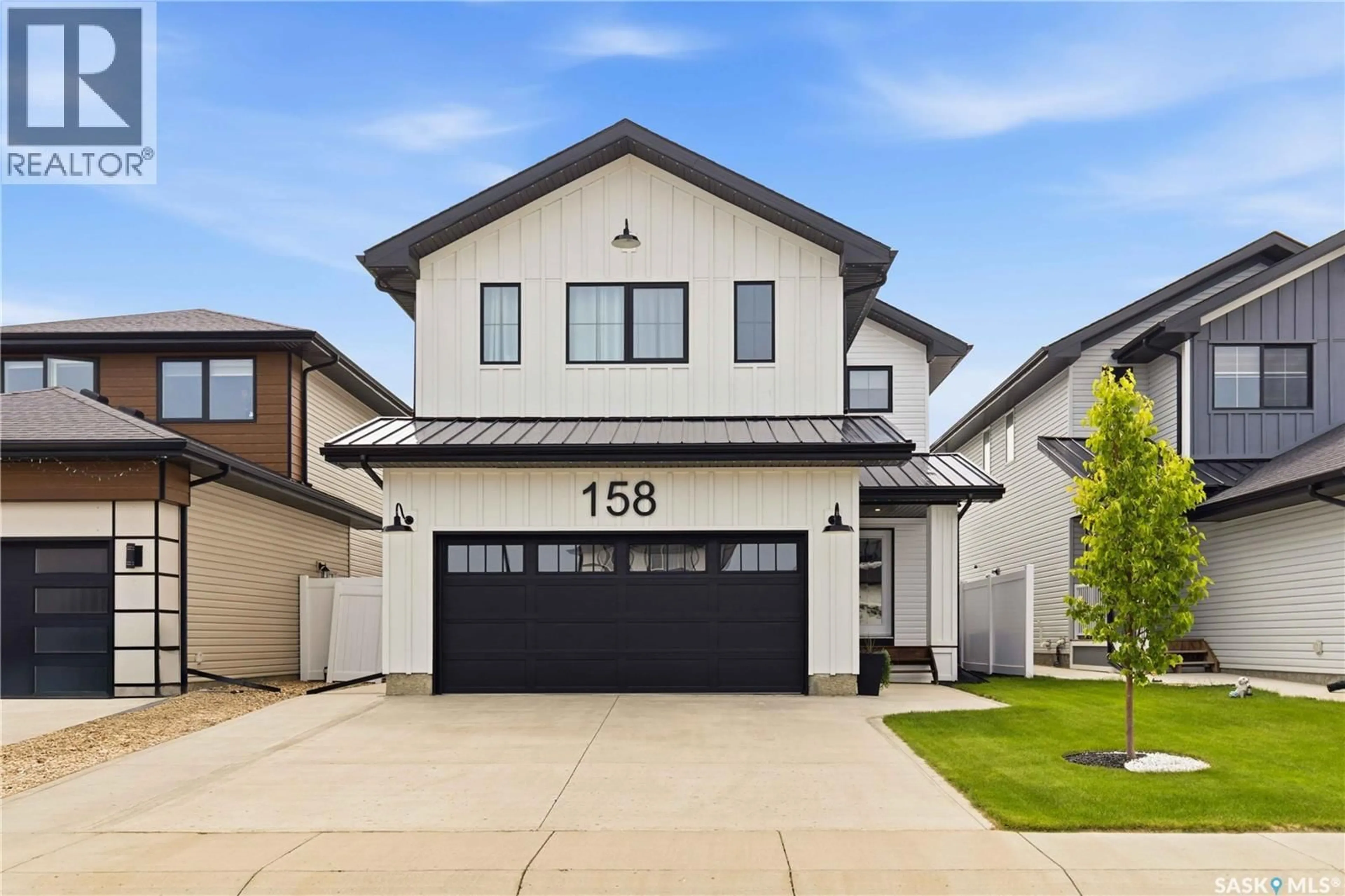 Home with vinyl exterior material, street for 158 CHELSOM BEND, Saskatoon Saskatchewan S7V0Z9