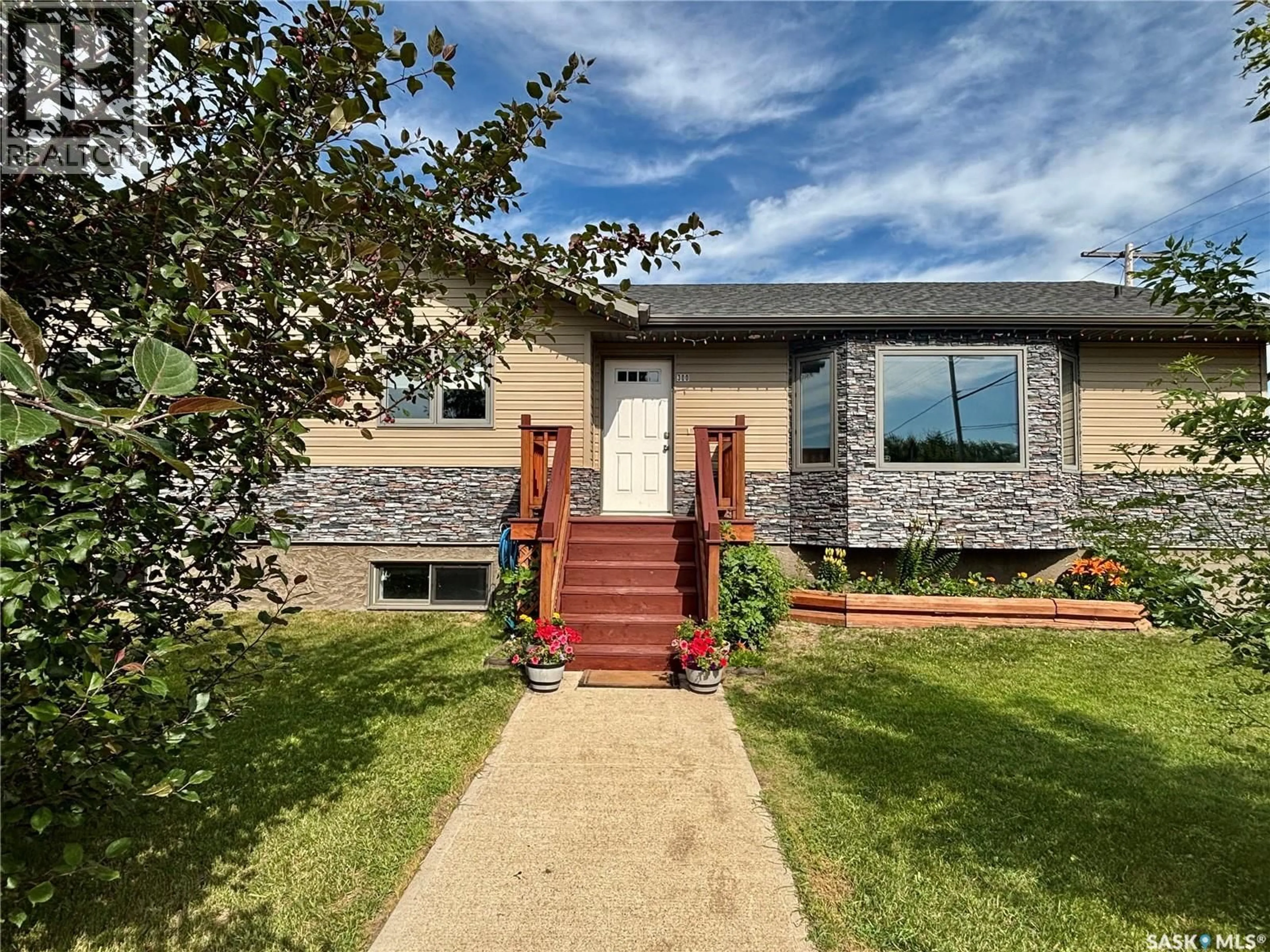 Home with brick exterior material, street for 300 7TH STREET, Vonda Saskatchewan S0K4N0