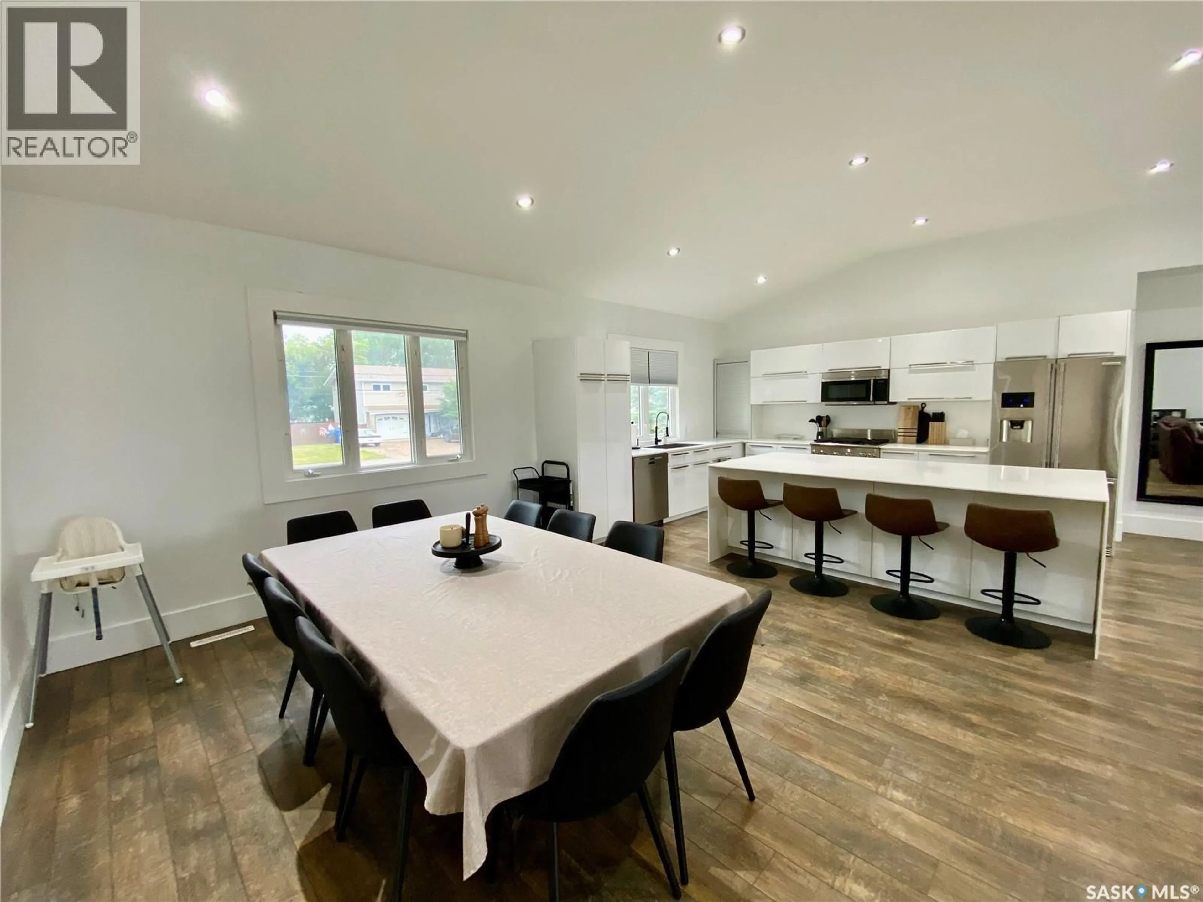 Open concept kitchen, wood/laminate floor for 837 PROSPECT AVENUE, Oxbow Saskatchewan S0C2B0