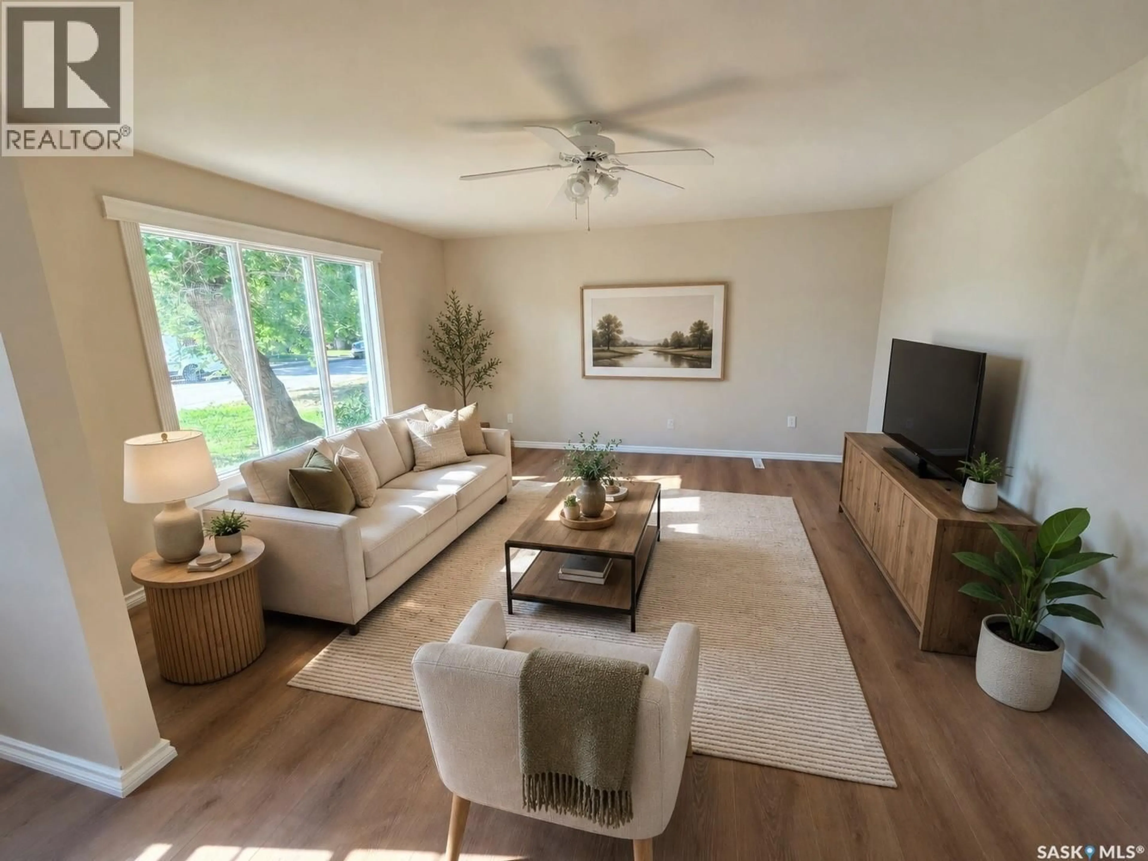 Living room with furniture, unknown for 859 CARTIER AVENUE, Moose Jaw Saskatchewan S6H1L9