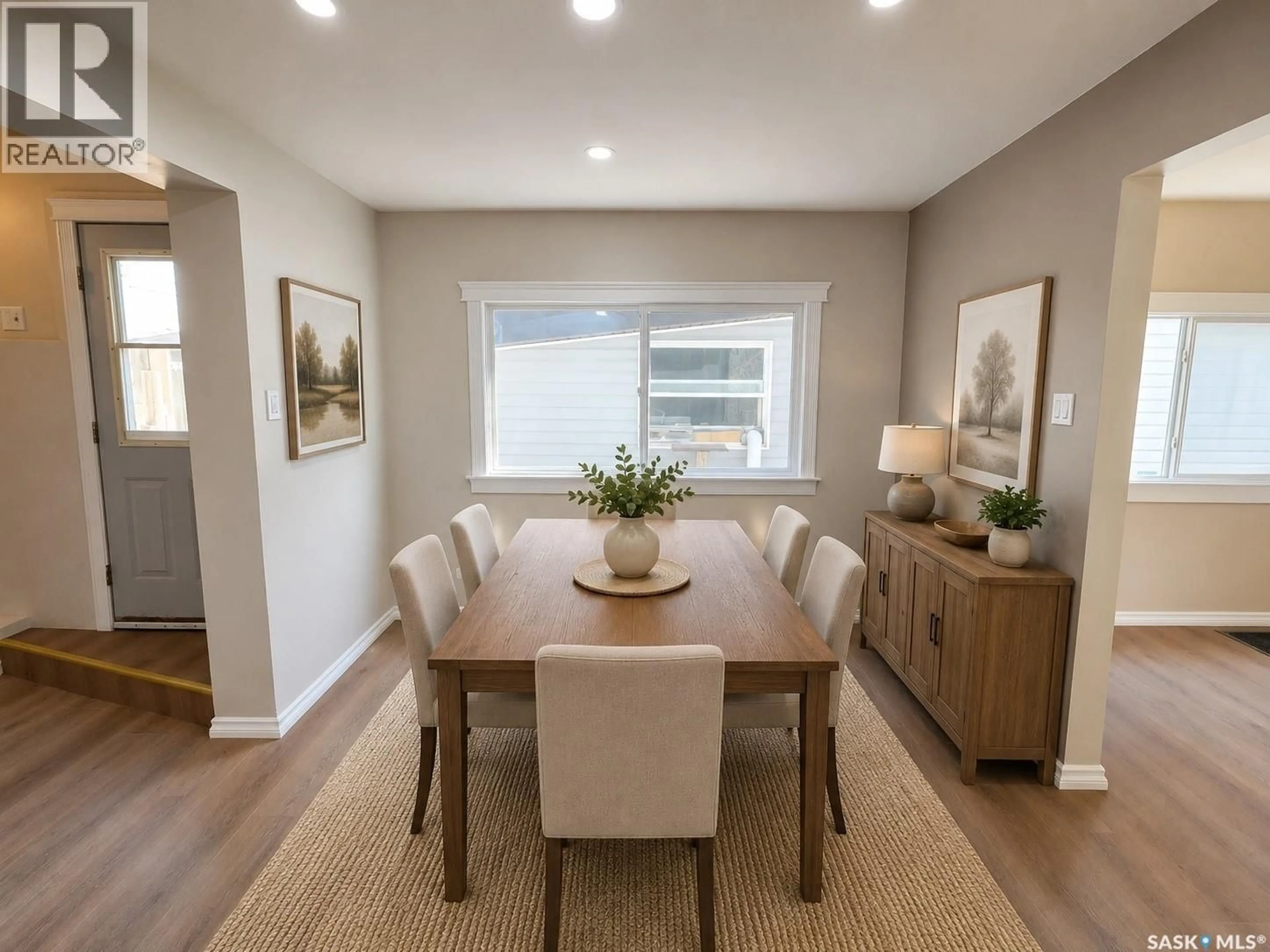 Dining room, wood/laminate floor for 859 CARTIER AVENUE, Moose Jaw Saskatchewan S6H1L9