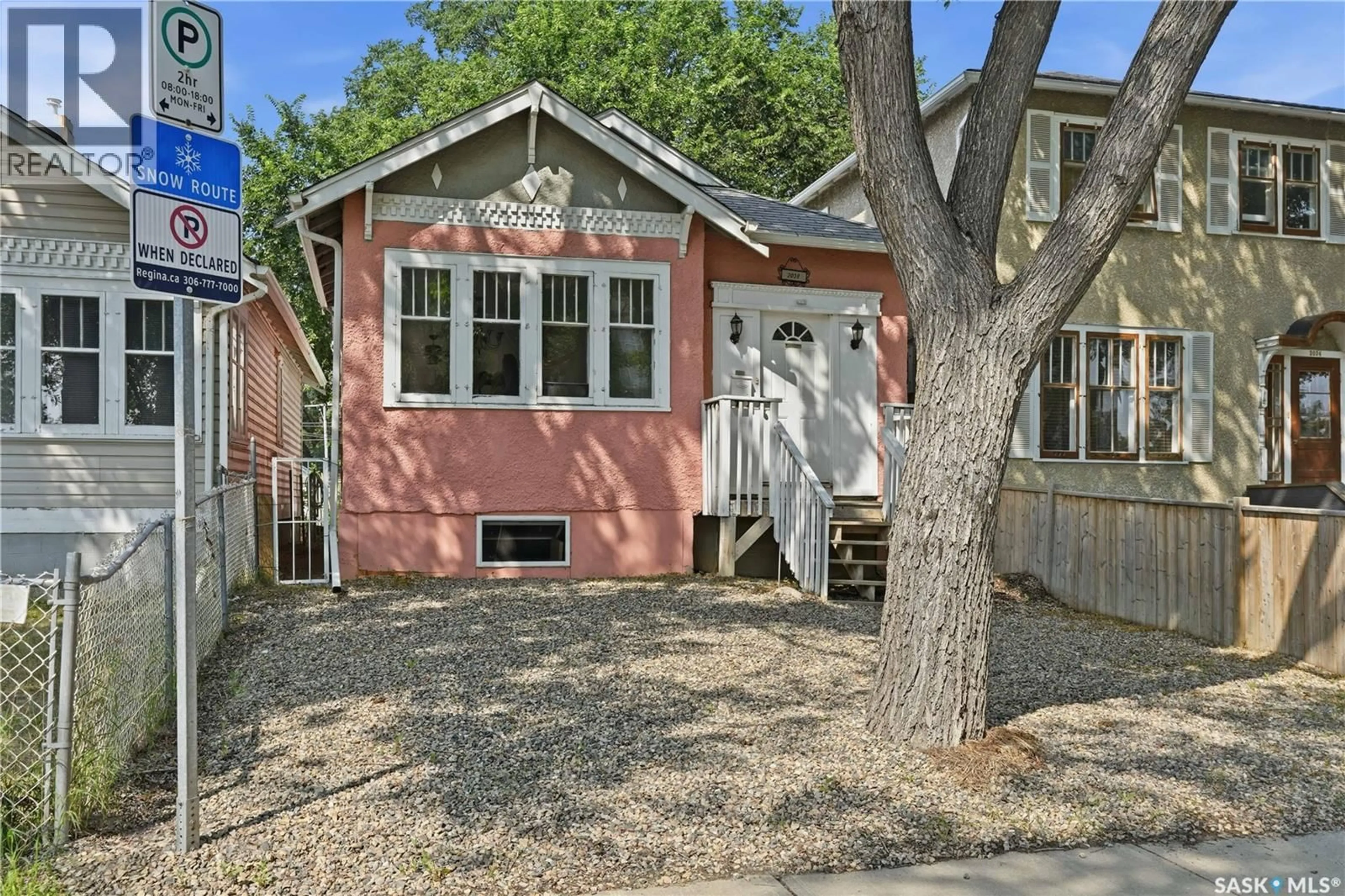 Home with brick exterior material, street for 2038 TORONTO STREET, Regina Saskatchewan S4P1N1