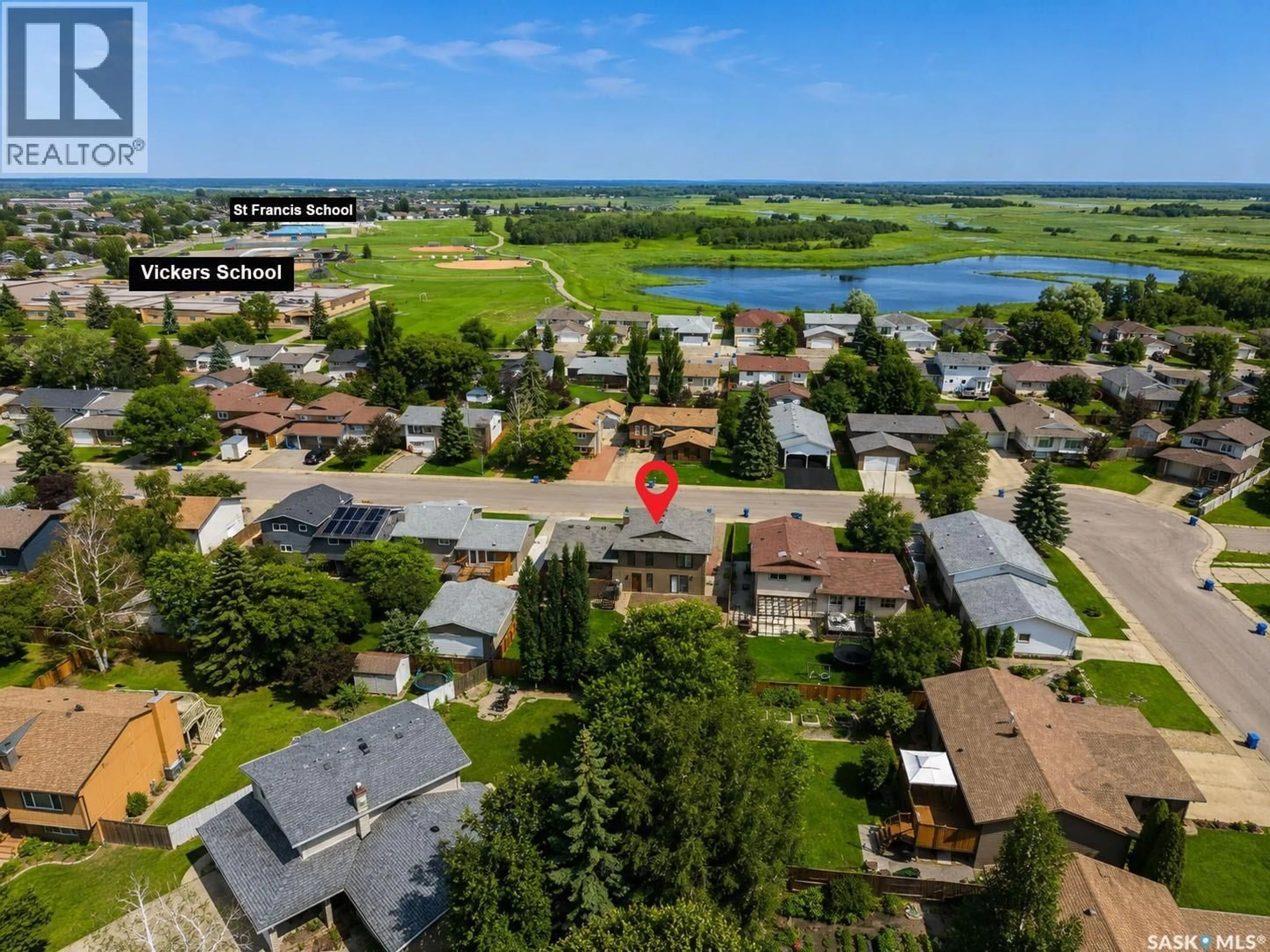 A pic from outside/outdoor area/front of a property/back of a property/a pic from drone, water/lake/river/ocean view for 3431 EAGLE CRESCENT, Prince Albert Saskatchewan S6V7N5