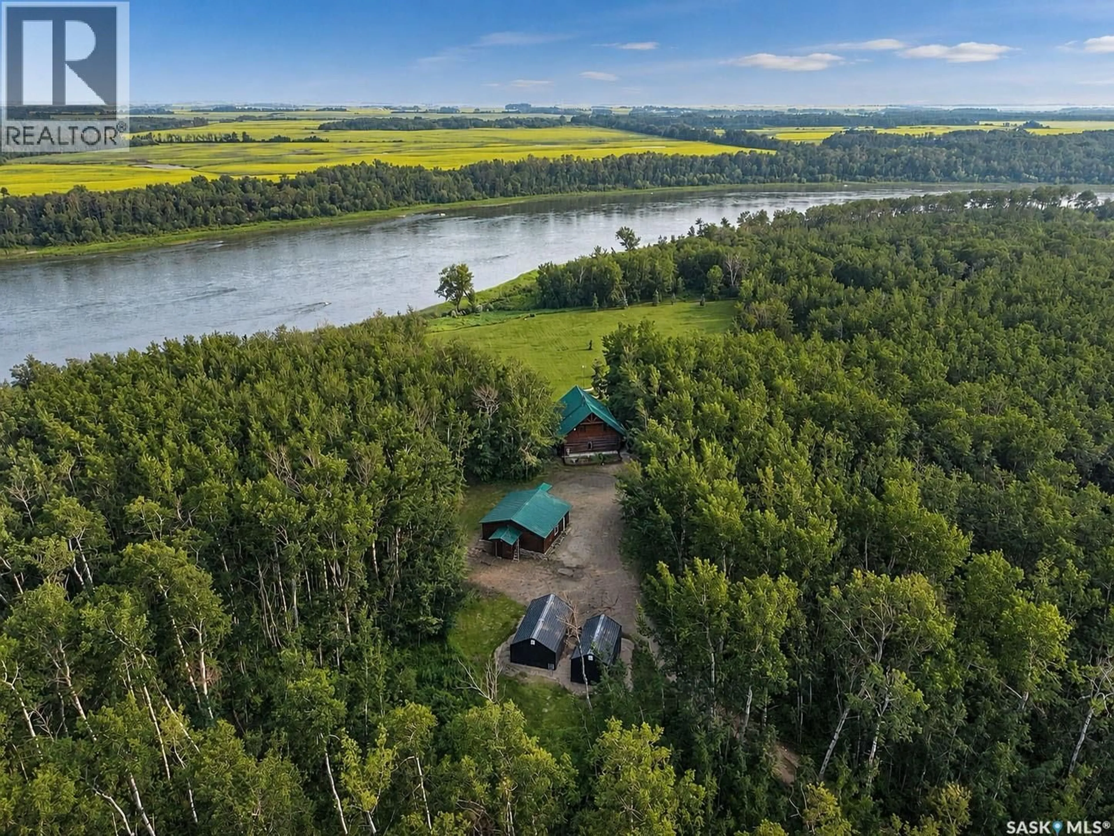 A pic from outside/outdoor area/front of a property/back of a property/a pic from drone, water/lake/river/ocean view for SASK RIVER FRONT ACREAGE, Prince Albert Rm No. 461 Saskatchewan S6V5P9