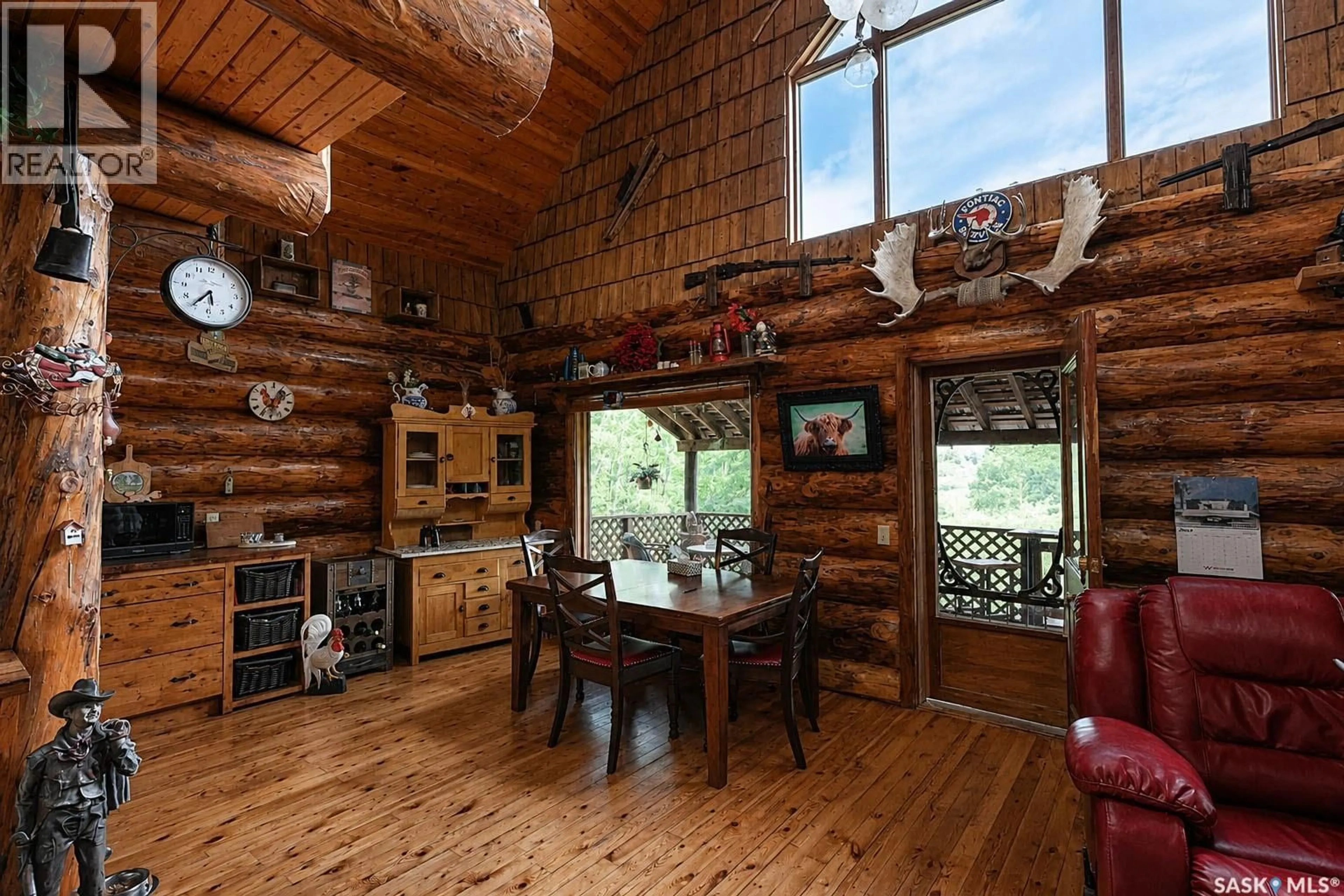 Dining room, wood/laminate floor for SASK RIVER FRONT ACREAGE, Prince Albert Rm No. 461 Saskatchewan S6V5P9