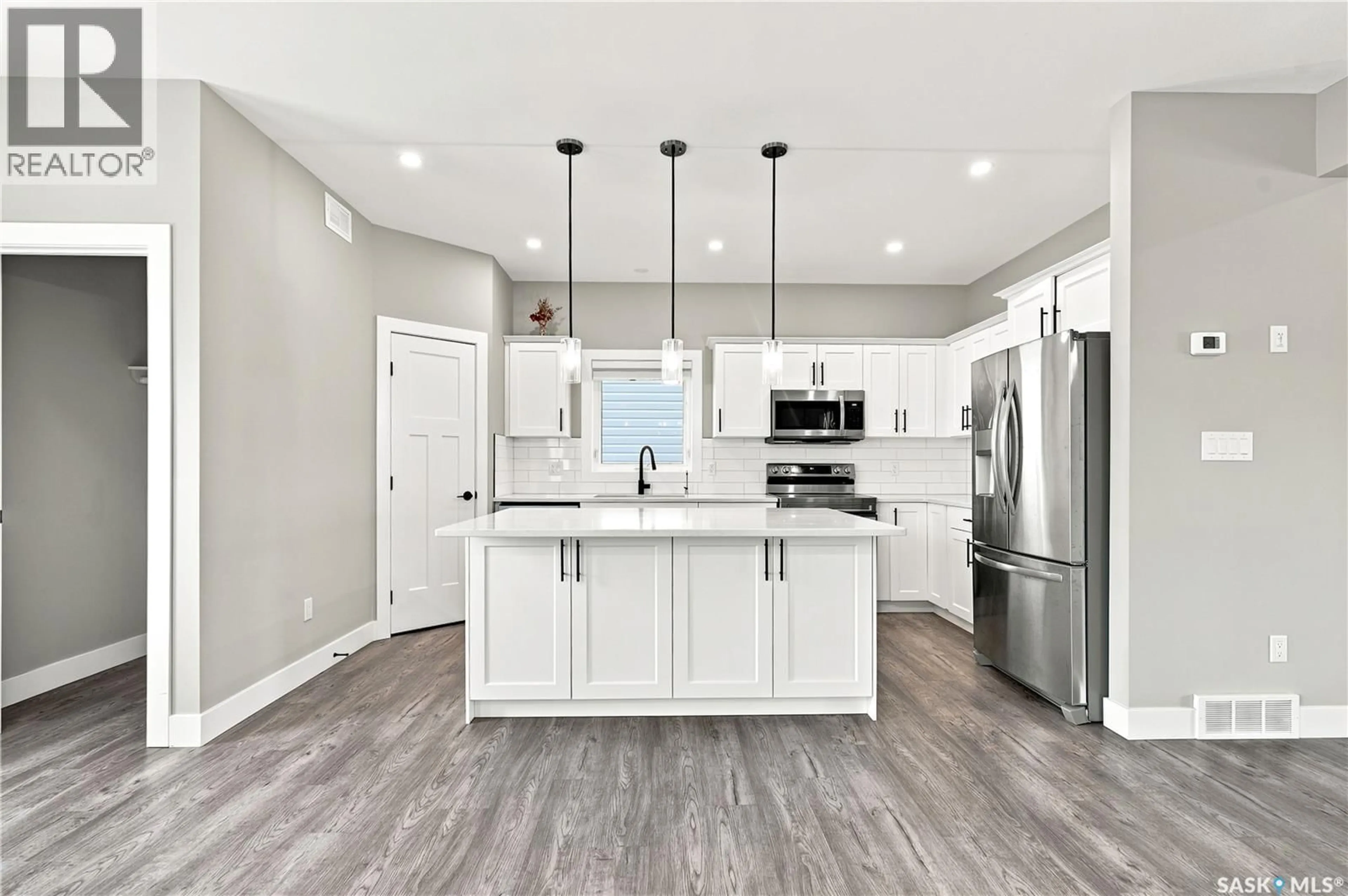 Open concept kitchen, unknown for 247 THAKUR STREET, Saskatoon Saskatchewan S7W1C5