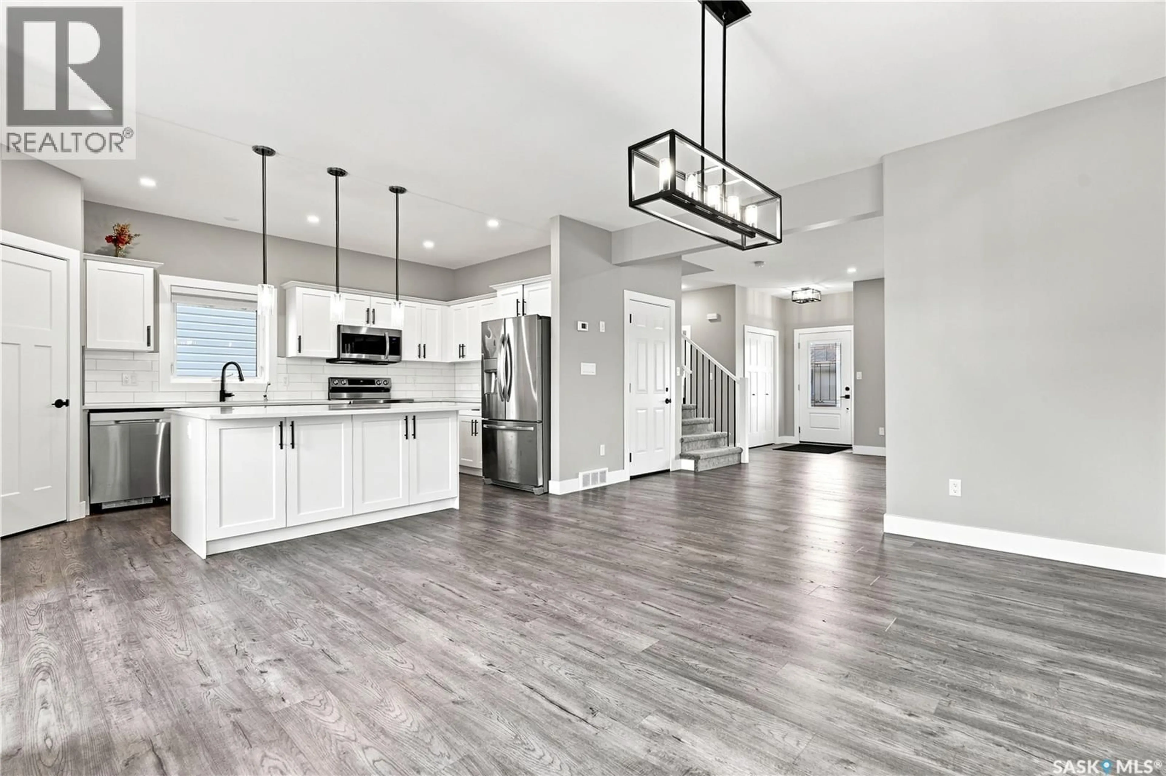Open concept kitchen, unknown for 247 THAKUR STREET, Saskatoon Saskatchewan S7W1C5