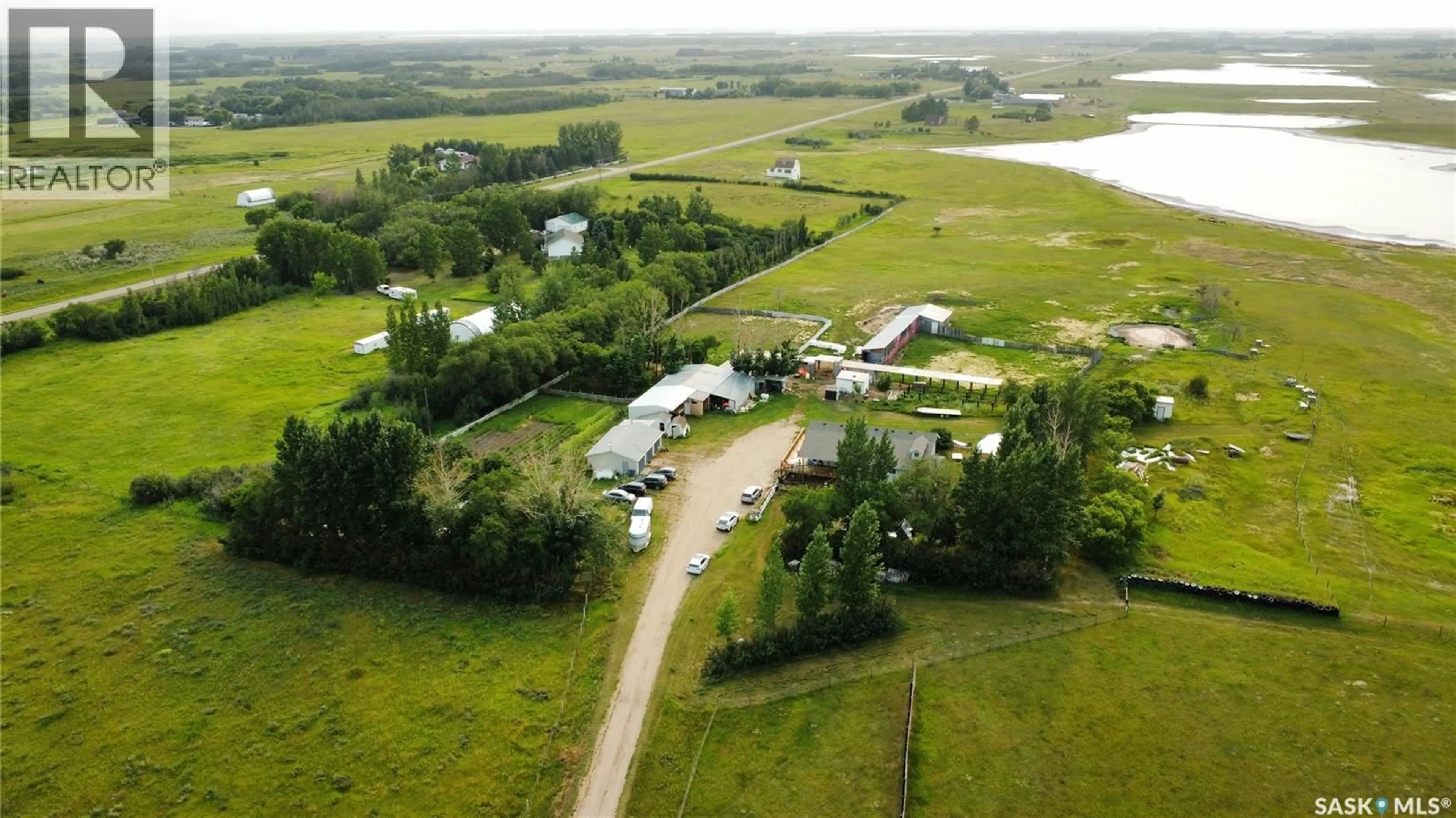 A pic from outside/outdoor area/front of a property/back of a property/a pic from drone, water/lake/river/ocean view for DENIZ ACREAGE, Vanscoy Rm No. 345 Saskatchewan S0L3J0