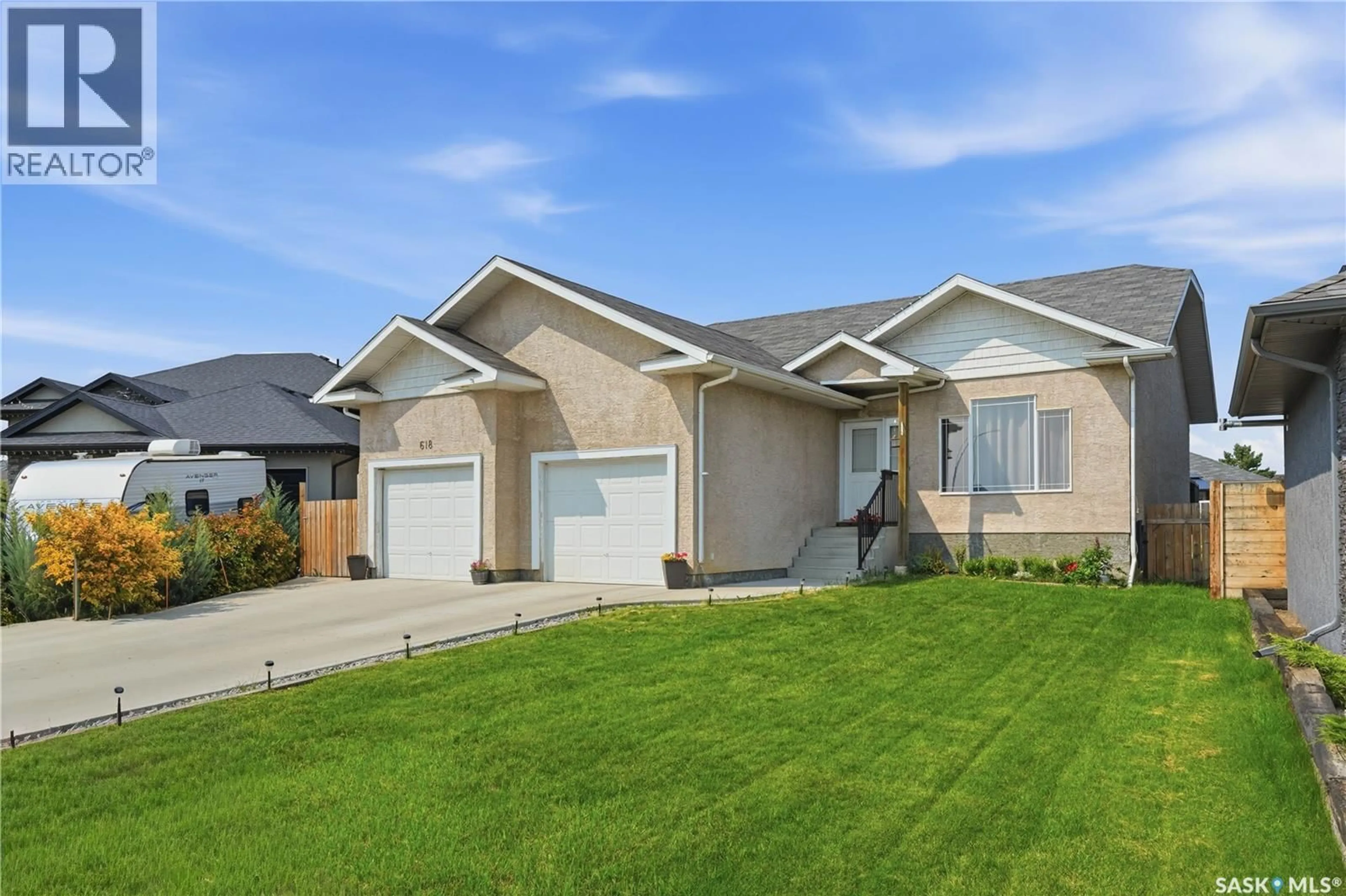 Home with vinyl exterior material, street for 618 DEER COURT, Warman Saskatchewan S0K4S0