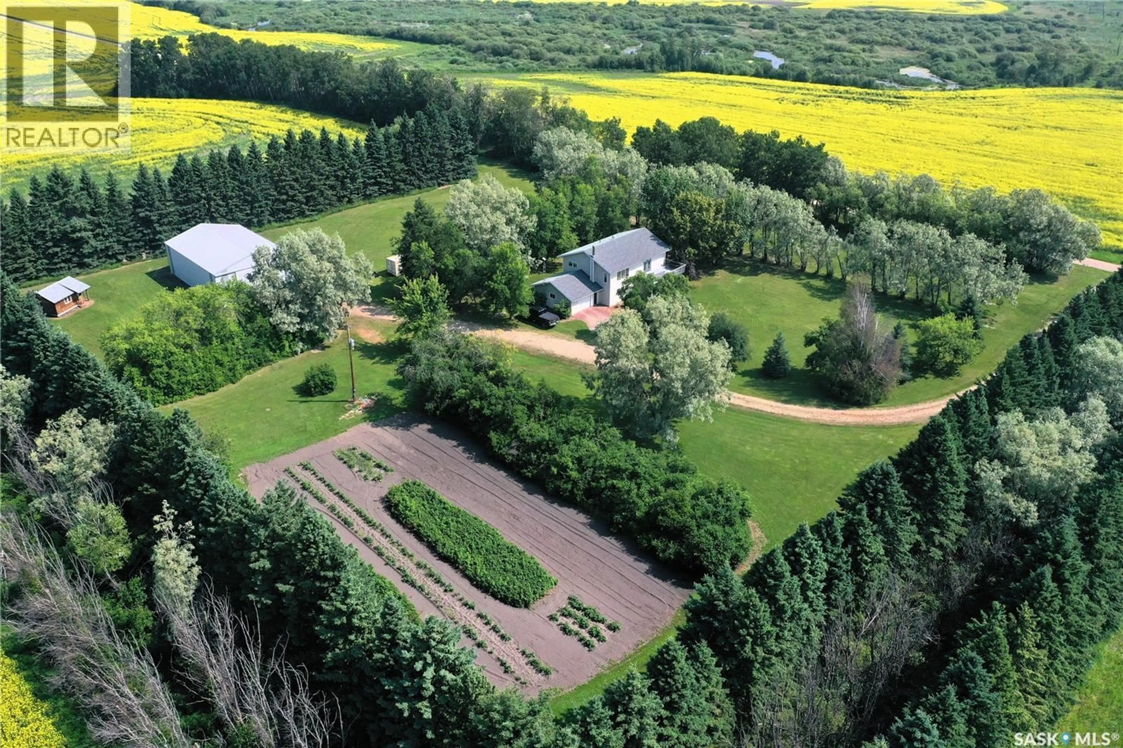 A pic from outside/outdoor area/front of a property/back of a property/a pic from drone, forest/trees view for SCOTT ACREAGE, Torch River Rm No. 488 Saskatchewan S0J0Z0