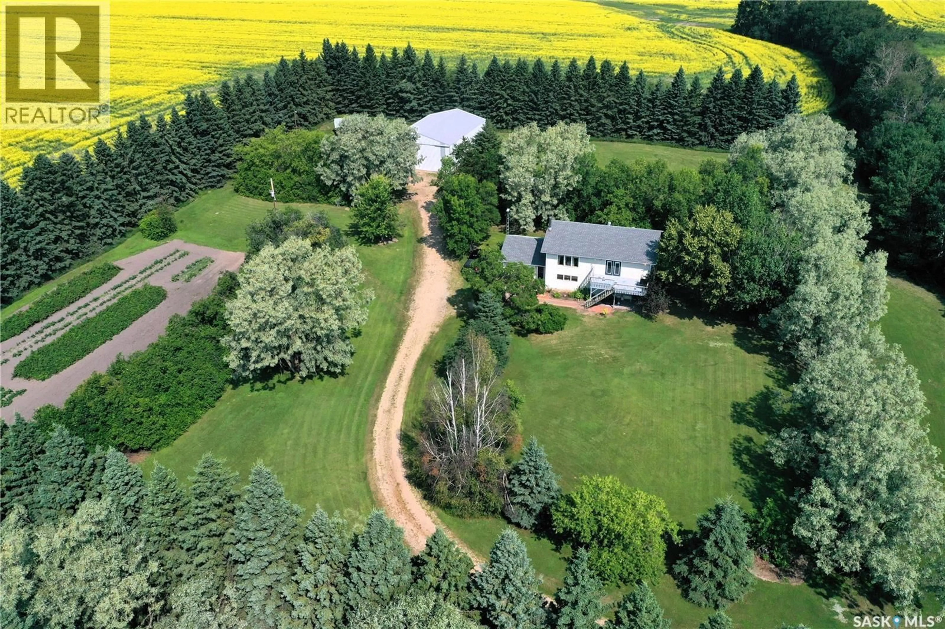 A pic from outside/outdoor area/front of a property/back of a property/a pic from drone, forest/trees view for SCOTT ACREAGE, Torch River Rm No. 488 Saskatchewan S0J0Z0