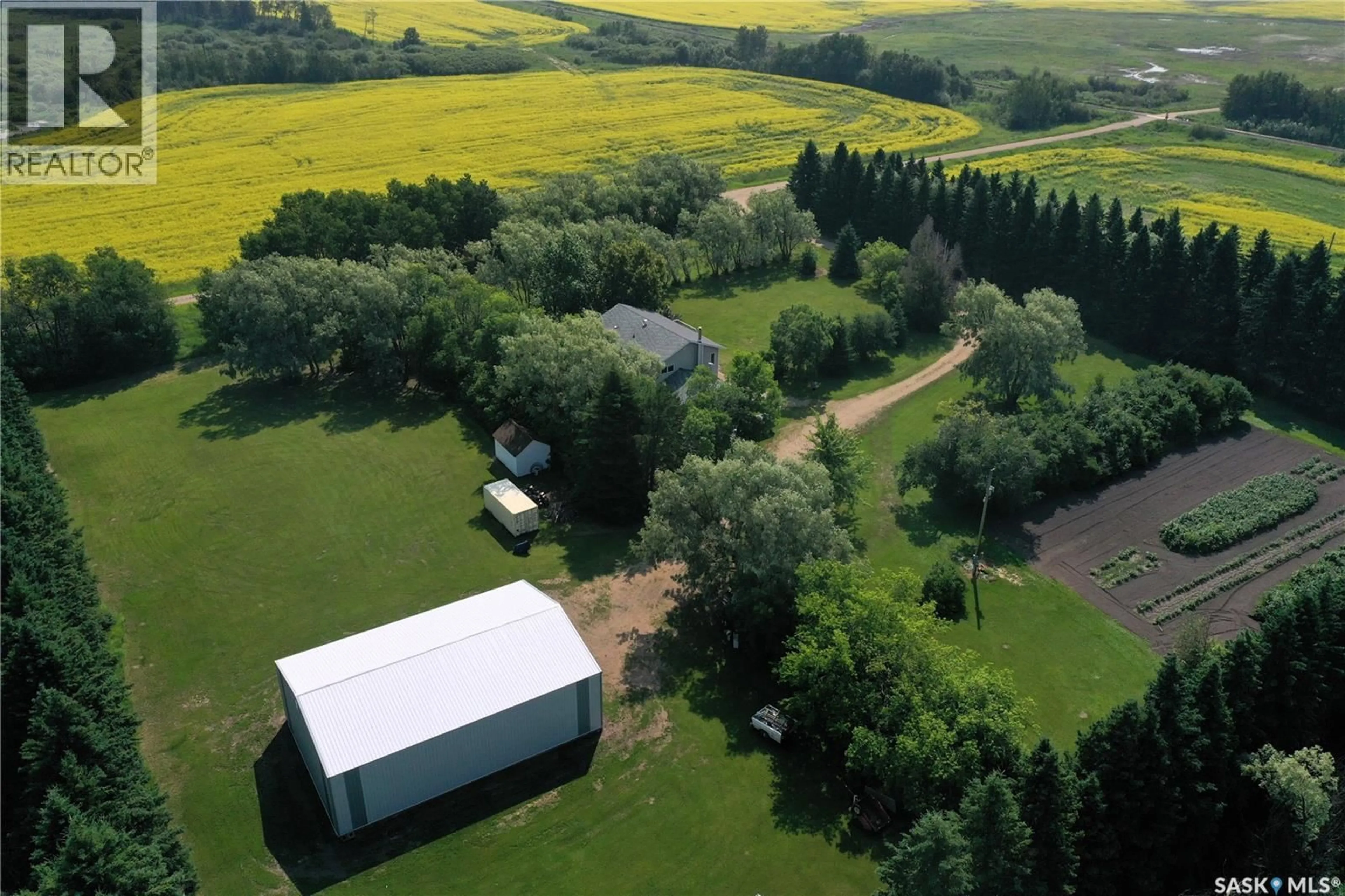 A pic from outside/outdoor area/front of a property/back of a property/a pic from drone, building for SCOTT ACREAGE, Torch River Rm No. 488 Saskatchewan S0J0Z0