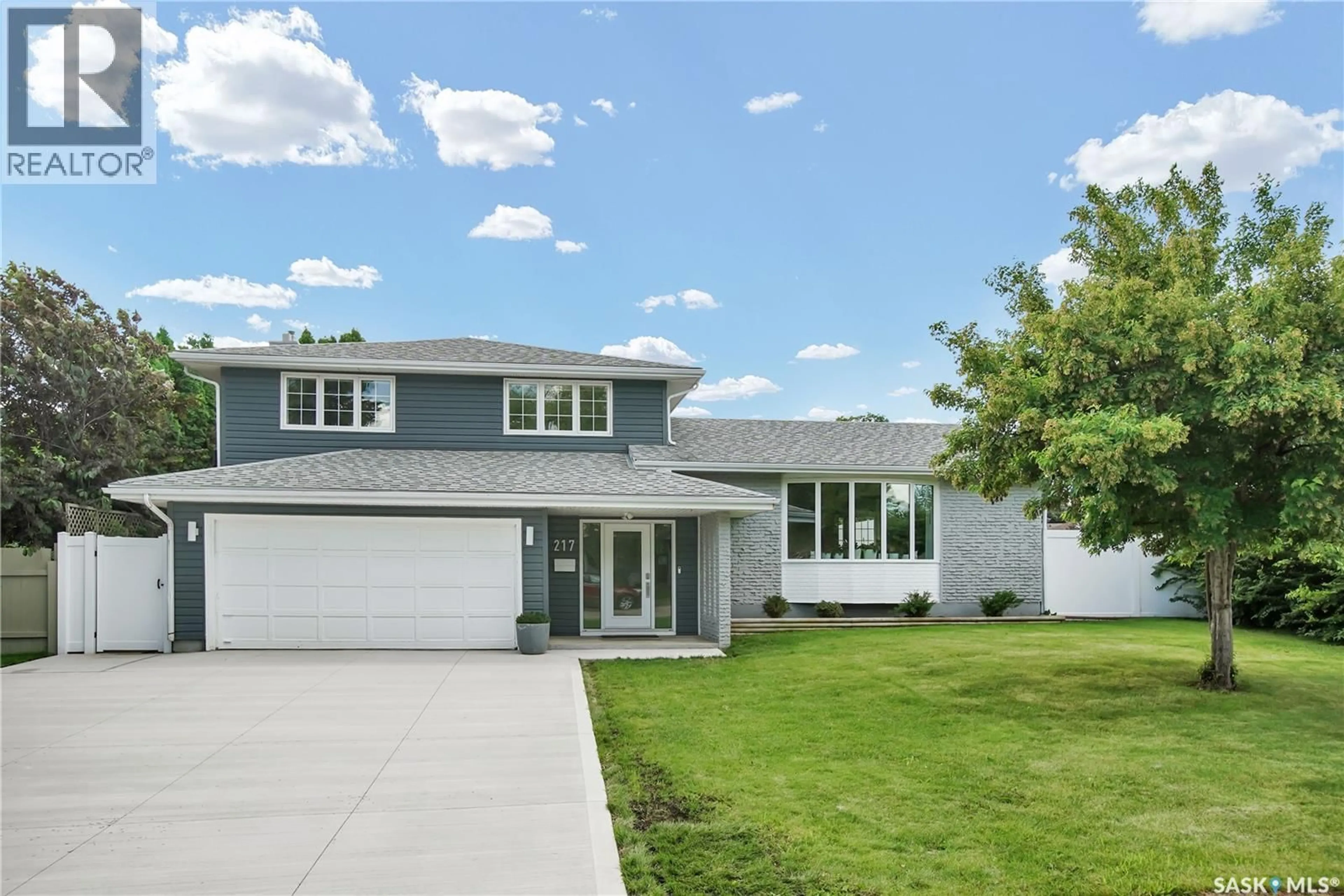 Home with vinyl exterior material, street for 217 MOUNT ALLISON CRESCENT, Saskatoon Saskatchewan S7H4G6